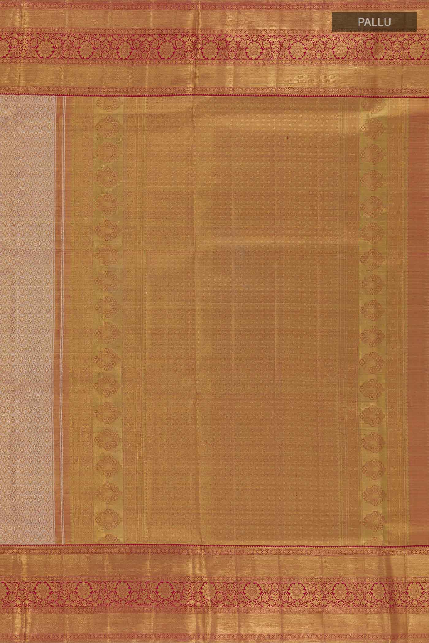 Close up image of the pallu of Golden Peach Kanjivaram Silk Saree with Zari Brocade on the body and Zari Border. 