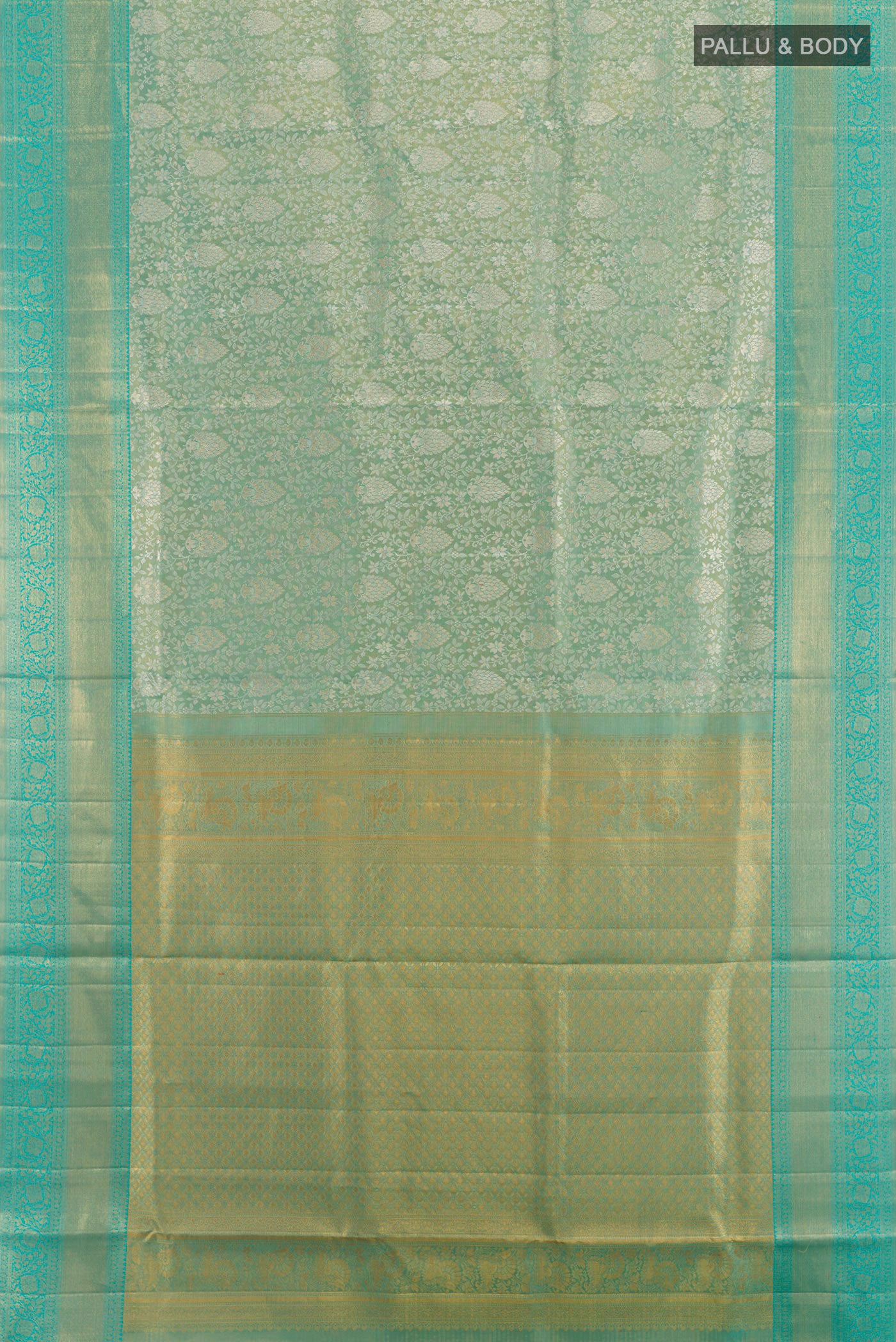 Flat view of Sea Green Kanjivaram Tissue Silk Saree with Zari Brocade on the body and Zari Border. 