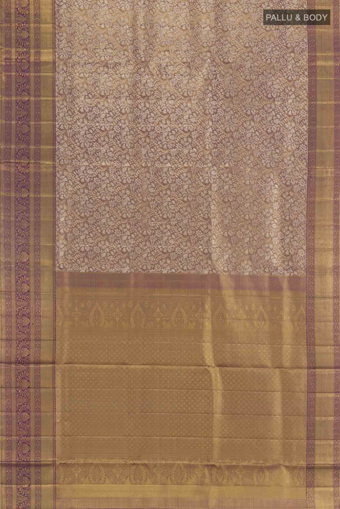 Flat view of Purple Kanjivaram Silk Saree with Zari Brocade on the body and Zari Border. 