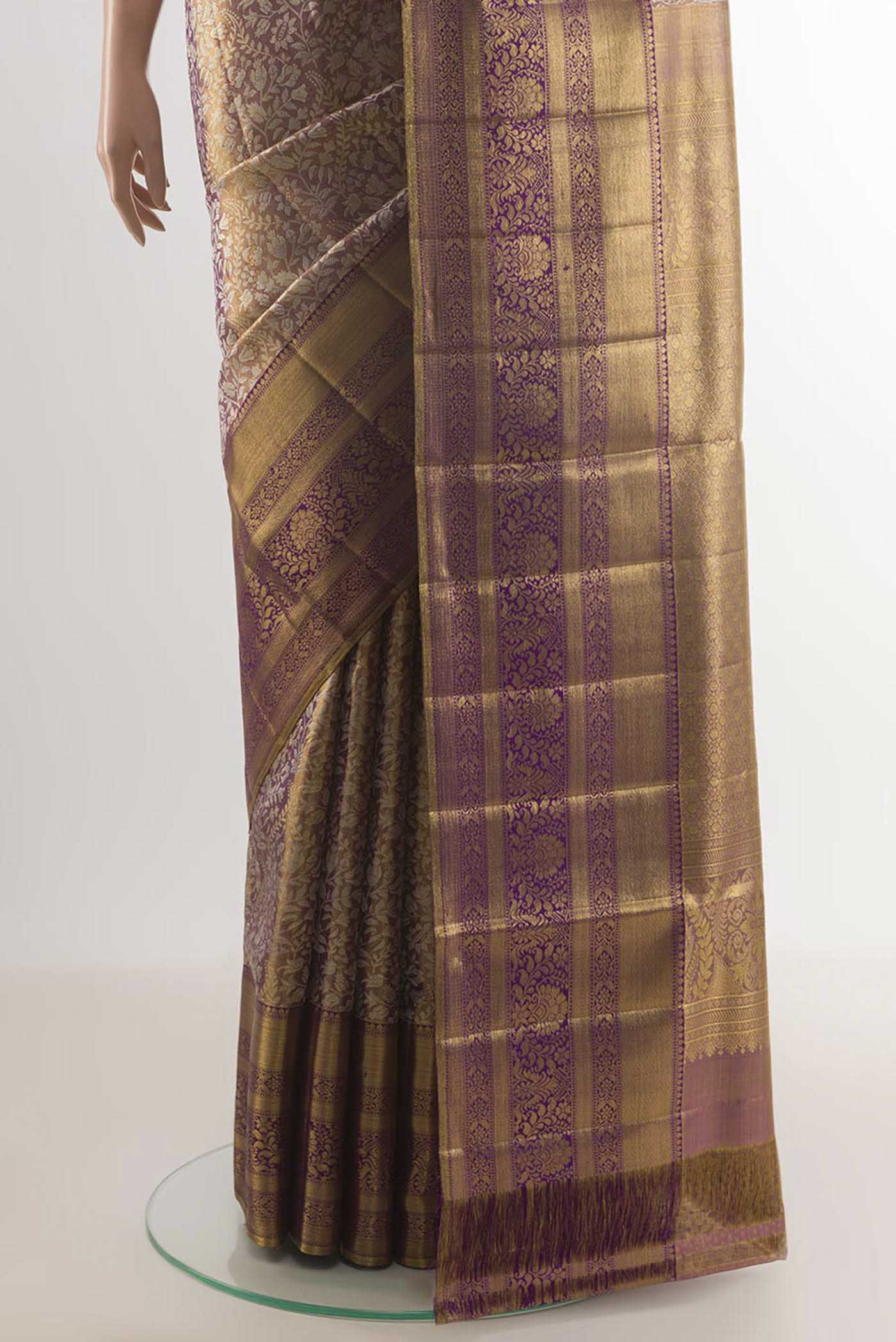Pleats and pallu of Purple Kanjivaram Silk Saree with Zari Brocade on the body and Zari Border. 