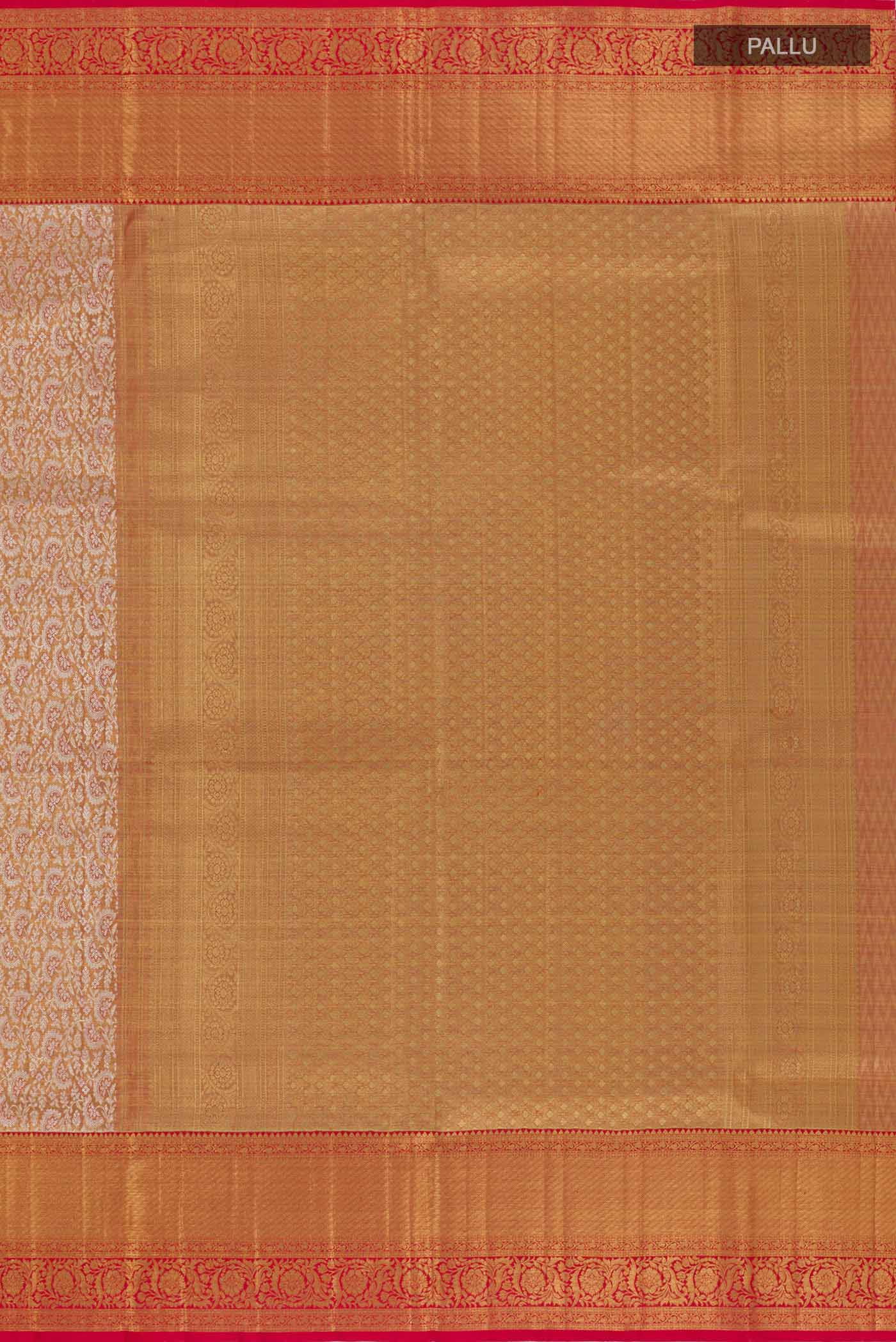 Close up image of the pallu of Rose Gold Kanjivaram Silk Saree with Zari Butta on the body and Zari Border. 