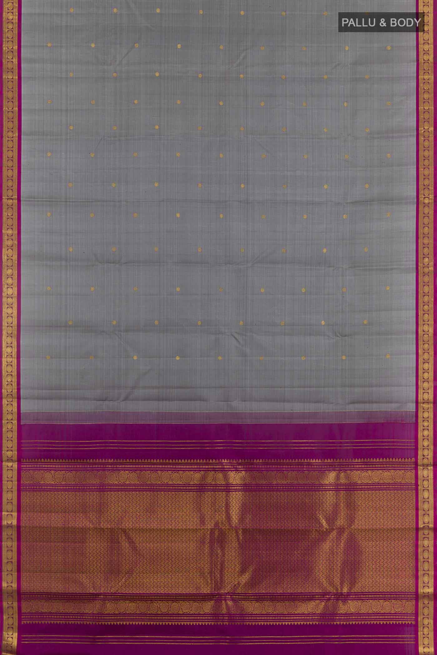 Flat view of Grey Kanchipuram Silk Saree with Zari Butta on the body and Zari Border. 