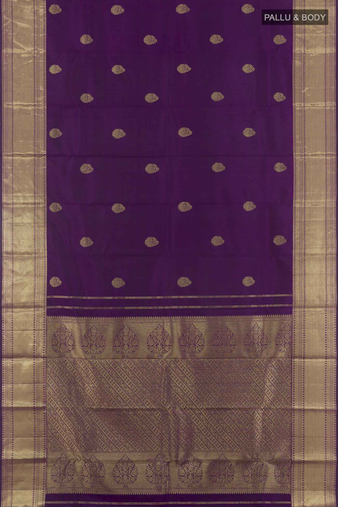Flat view of Purple Kanchipuram Silk Saree with Zari Butta on the body and Zari Border. 