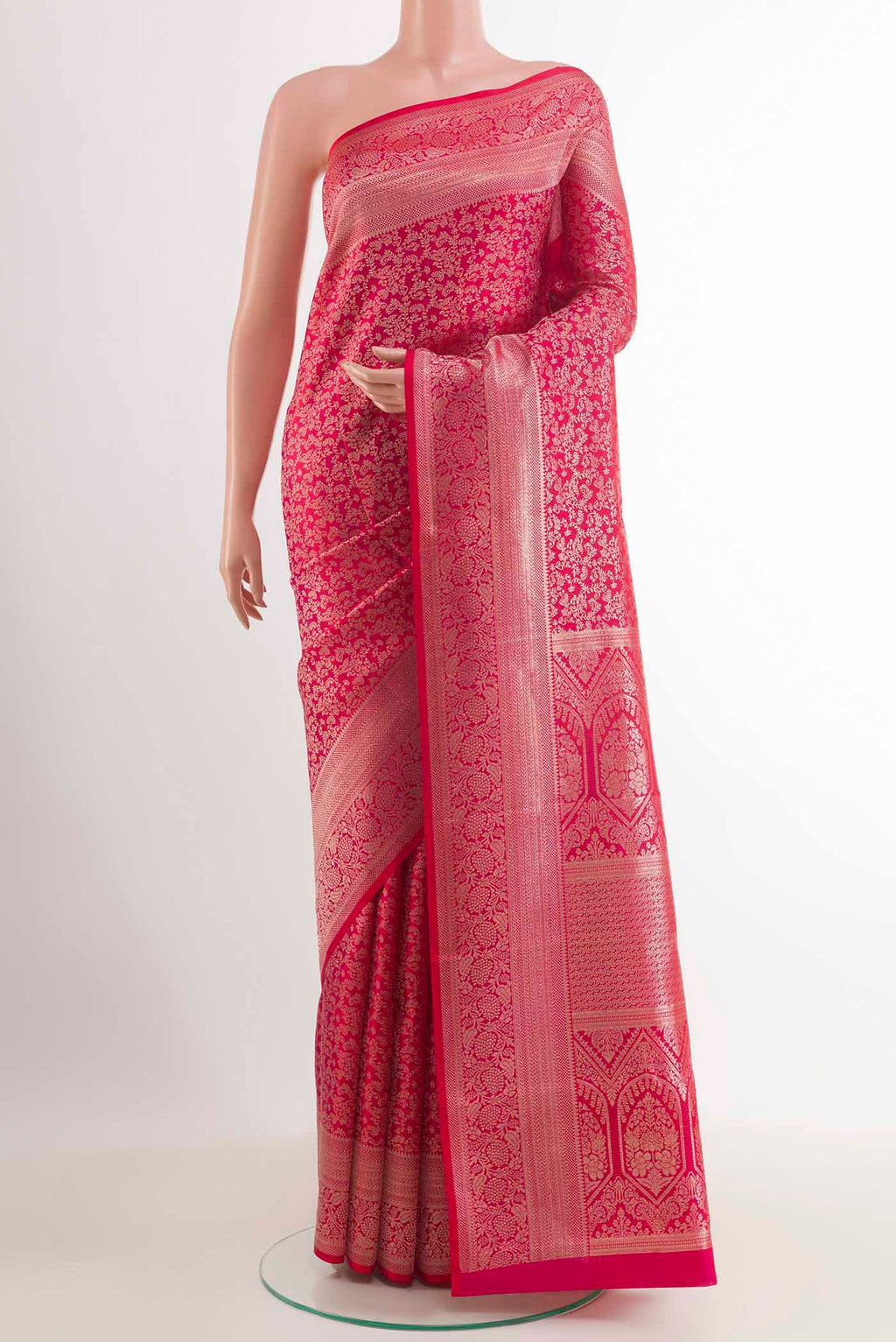 Red Kanchipuram Silk Saree with Zari Brocade on the body and Zari Border.  displayed on a mannequin