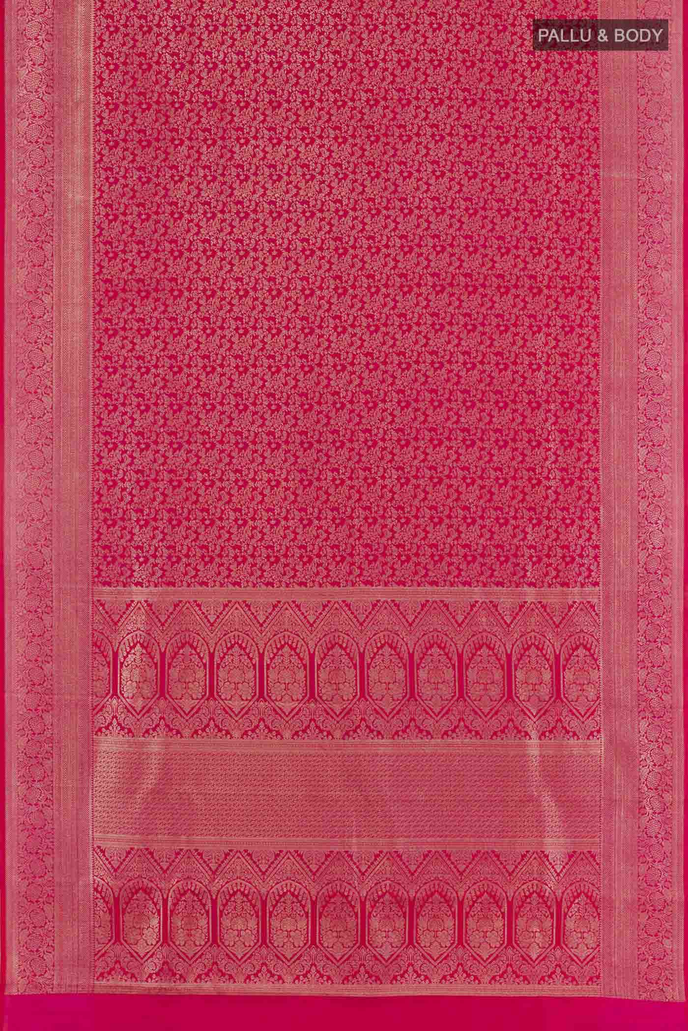 Flat view of Red Kanchipuram Silk Saree with Zari Brocade on the body and Zari Border. 