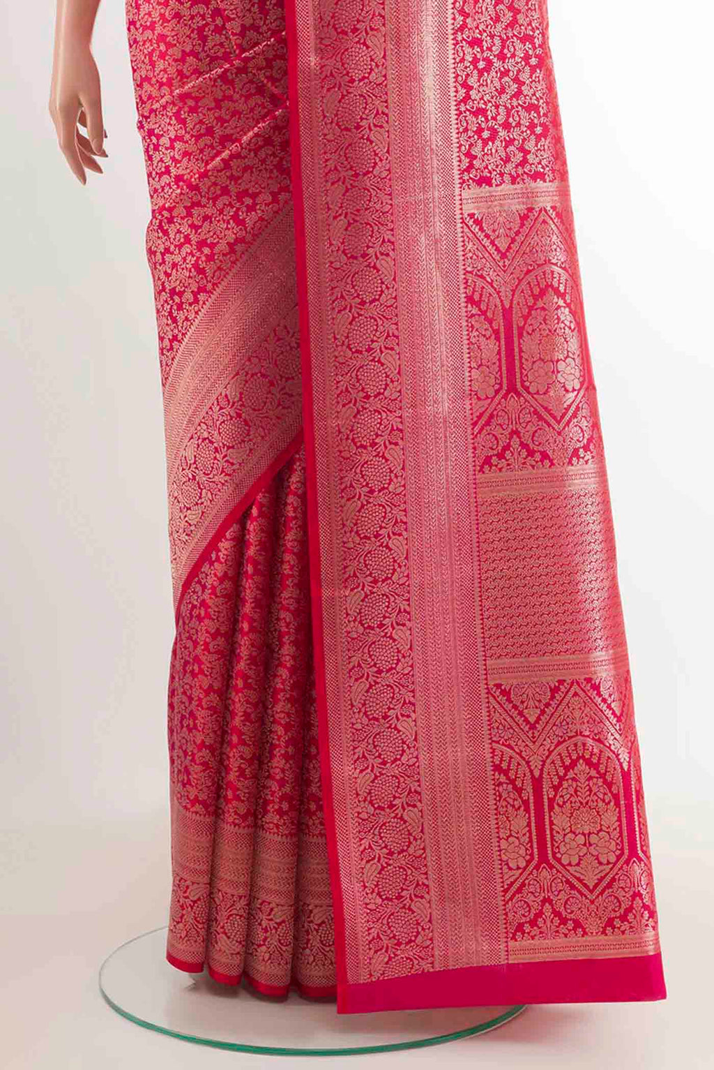 Pleats and pallu of Red Kanchipuram Silk Saree with Zari Brocade on the body and Zari Border. 