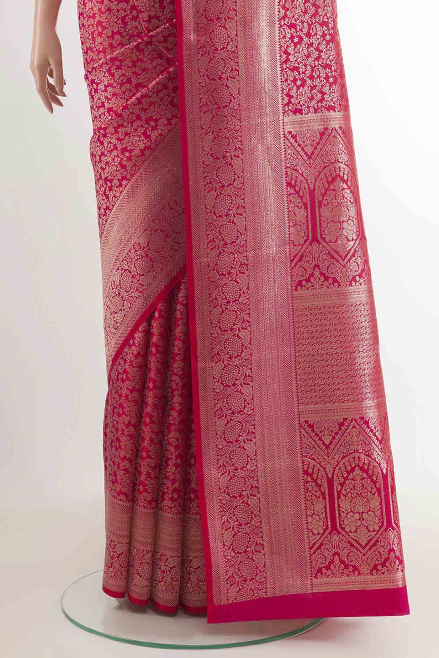 Pleats and pallu of Red Kanchipuram Silk Saree with Zari Brocade on the body and Zari Border. 