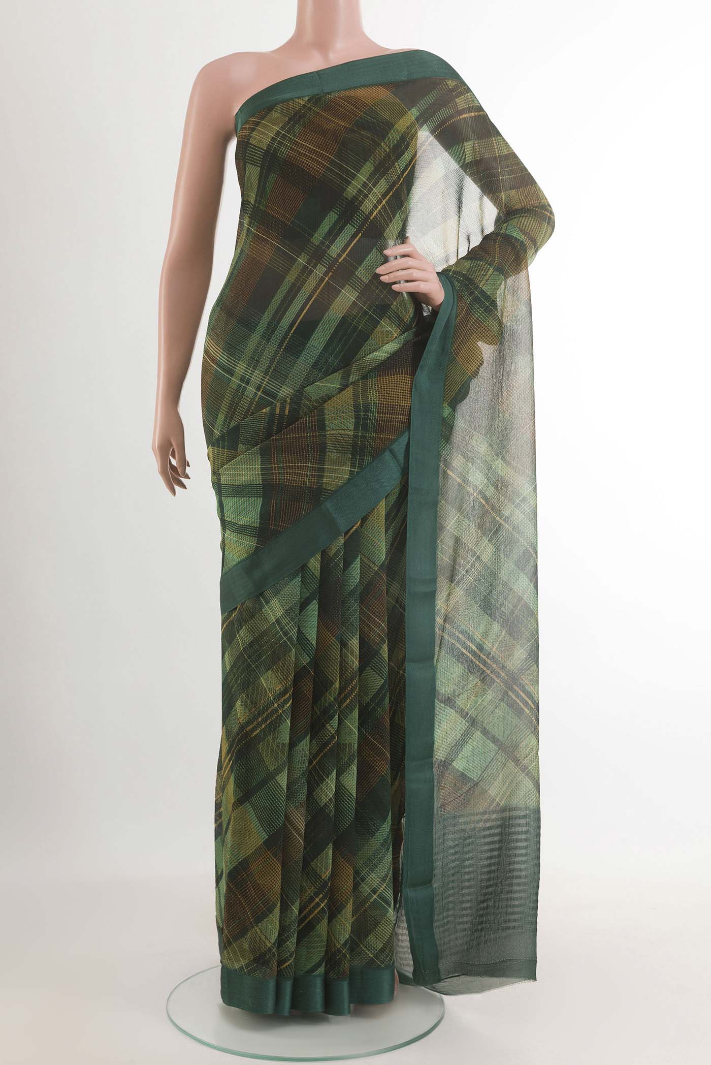 Green Mysore Chiffon Saree with Printed design on the body and Plain Border.  displayed on a mannequin