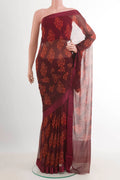Maroon Mysore Chiffon Saree with Printed design on the body and Plain Border.  displayed on a mannequin