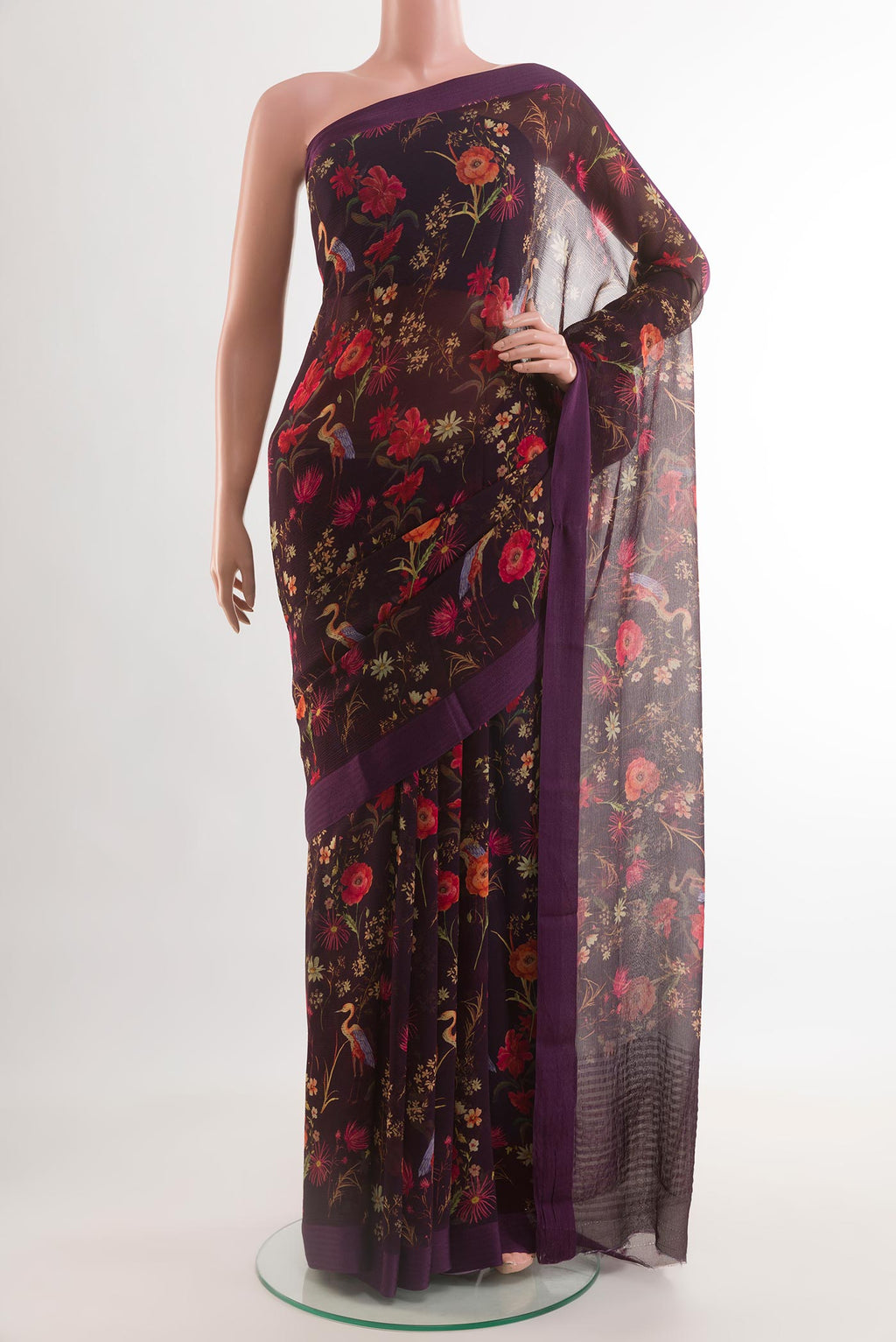 Purple Mysore Chiffon Saree with Printed design on the body and Zari Border.  displayed on a mannequin
