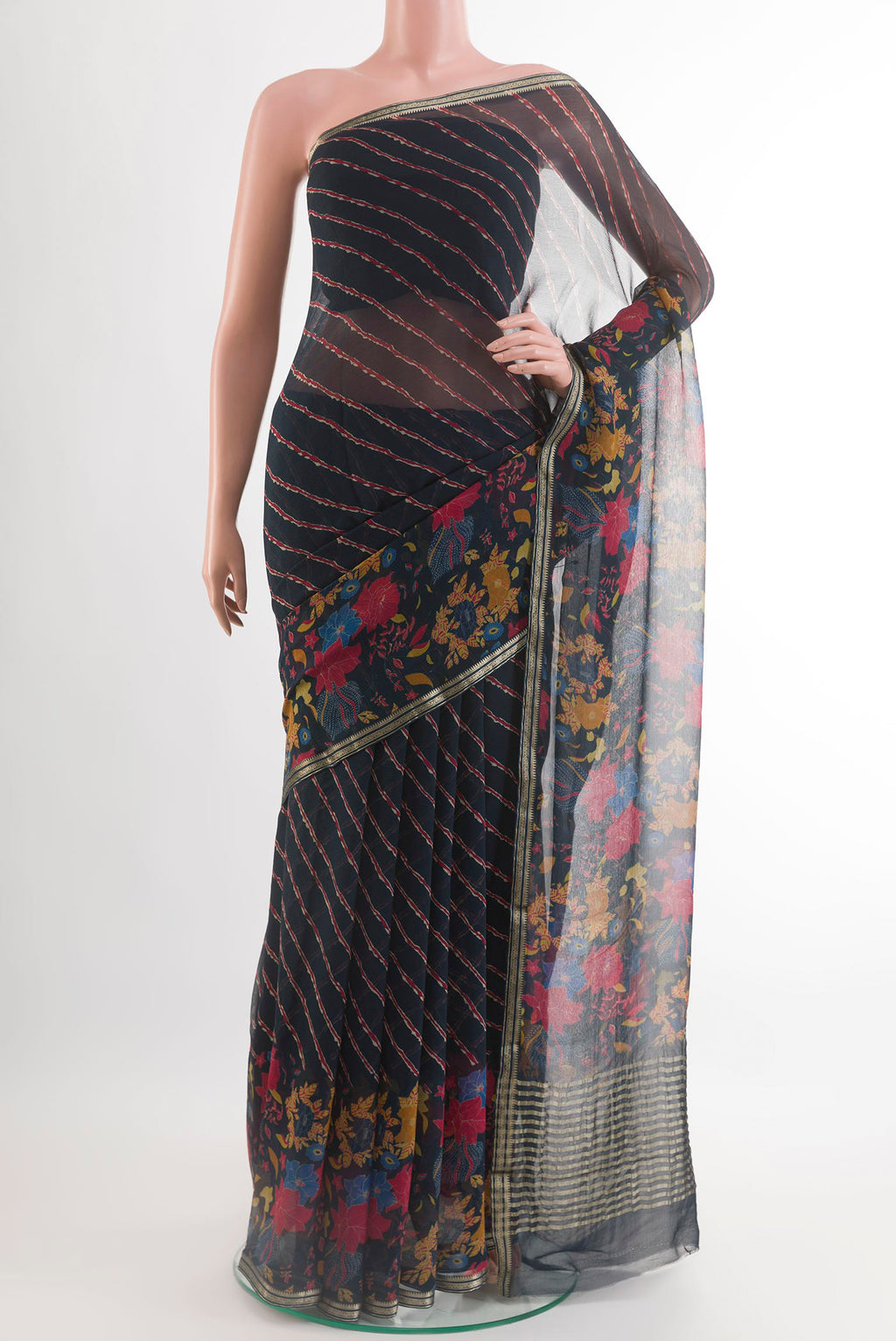 Blue Mysore Chiffon Saree with Printed design on the body and Plain Border.  displayed on a mannequin