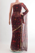Maroon Mysore Chiffon Saree with Printed design on the body and Plain Border.  displayed on a mannequin
