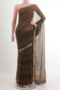 Green Mysore Chiffon Saree with Printed design on the body and Zari Border.  displayed on a mannequin