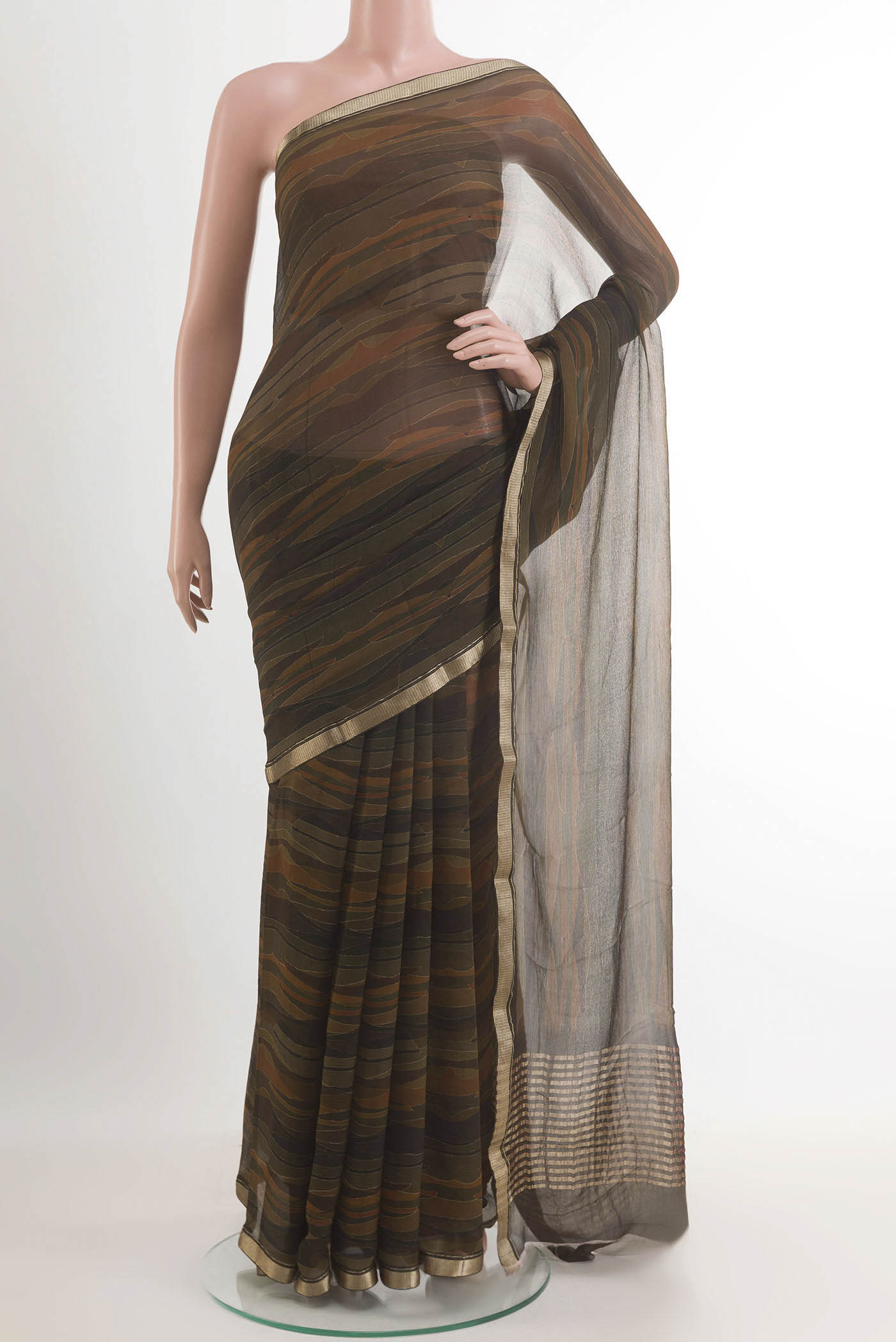 Green Mysore Chiffon Saree with Printed design on the body and Zari Border.  displayed on a mannequin