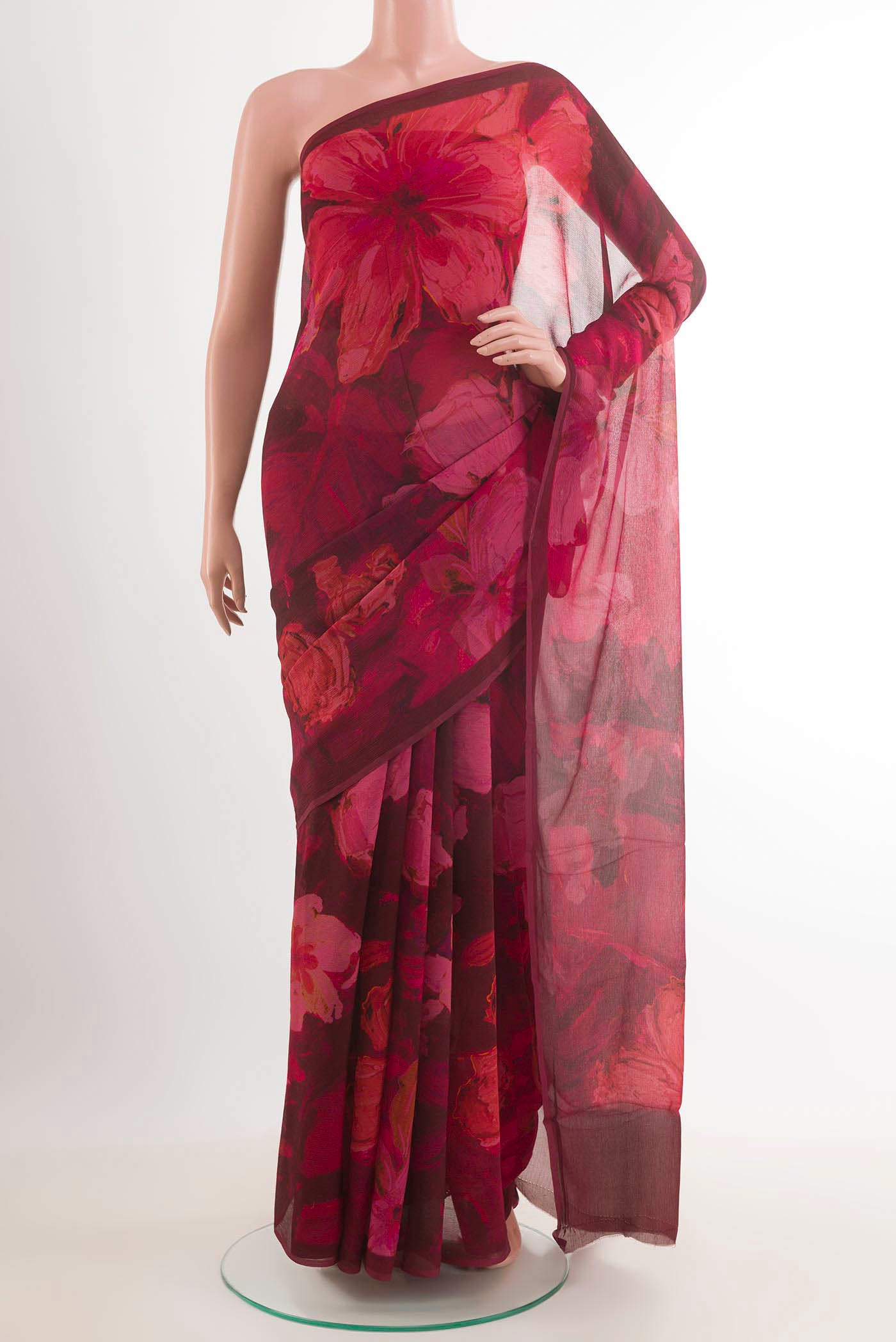 Red Mysore Chiffon Saree with Printed design on the body and Plain Border.  displayed on a mannequin