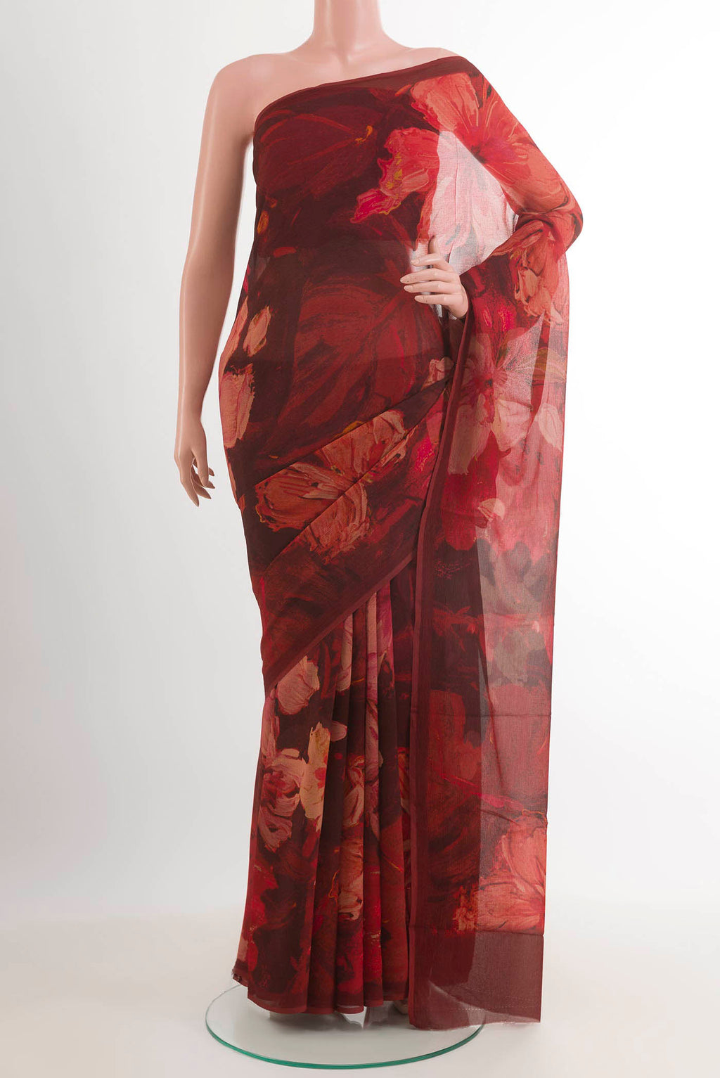 Red Mysore Chiffon Saree with Printed design on the body and Plain Border.  displayed on a mannequin