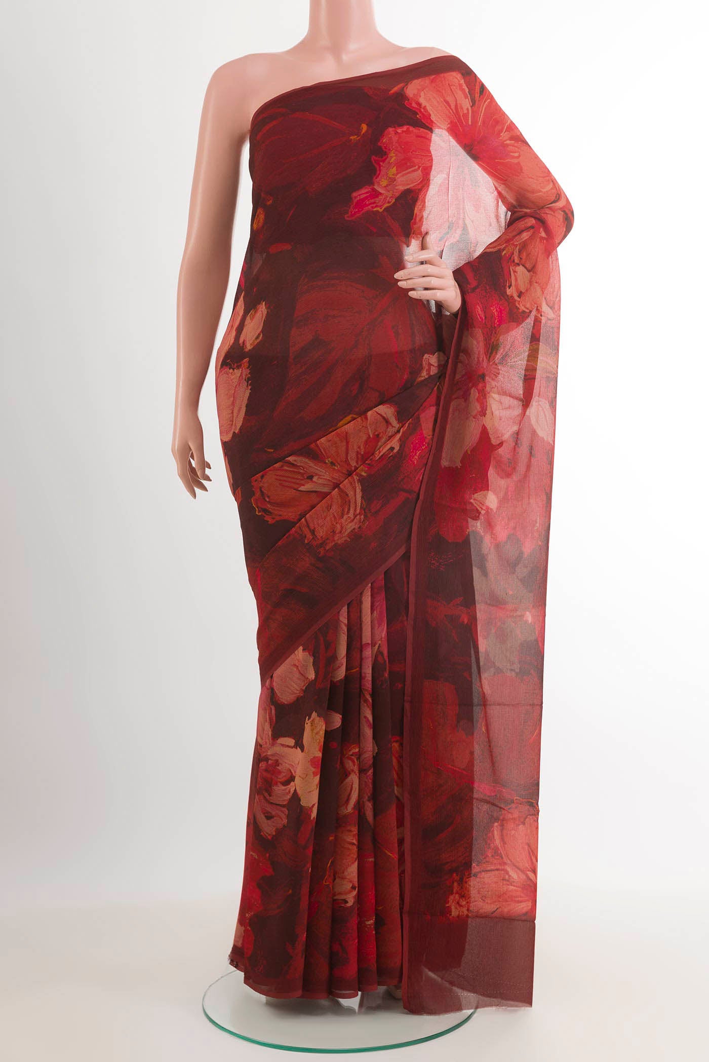 Red Mysore Chiffon Saree with Printed design on the body and Plain Border.  displayed on a mannequin