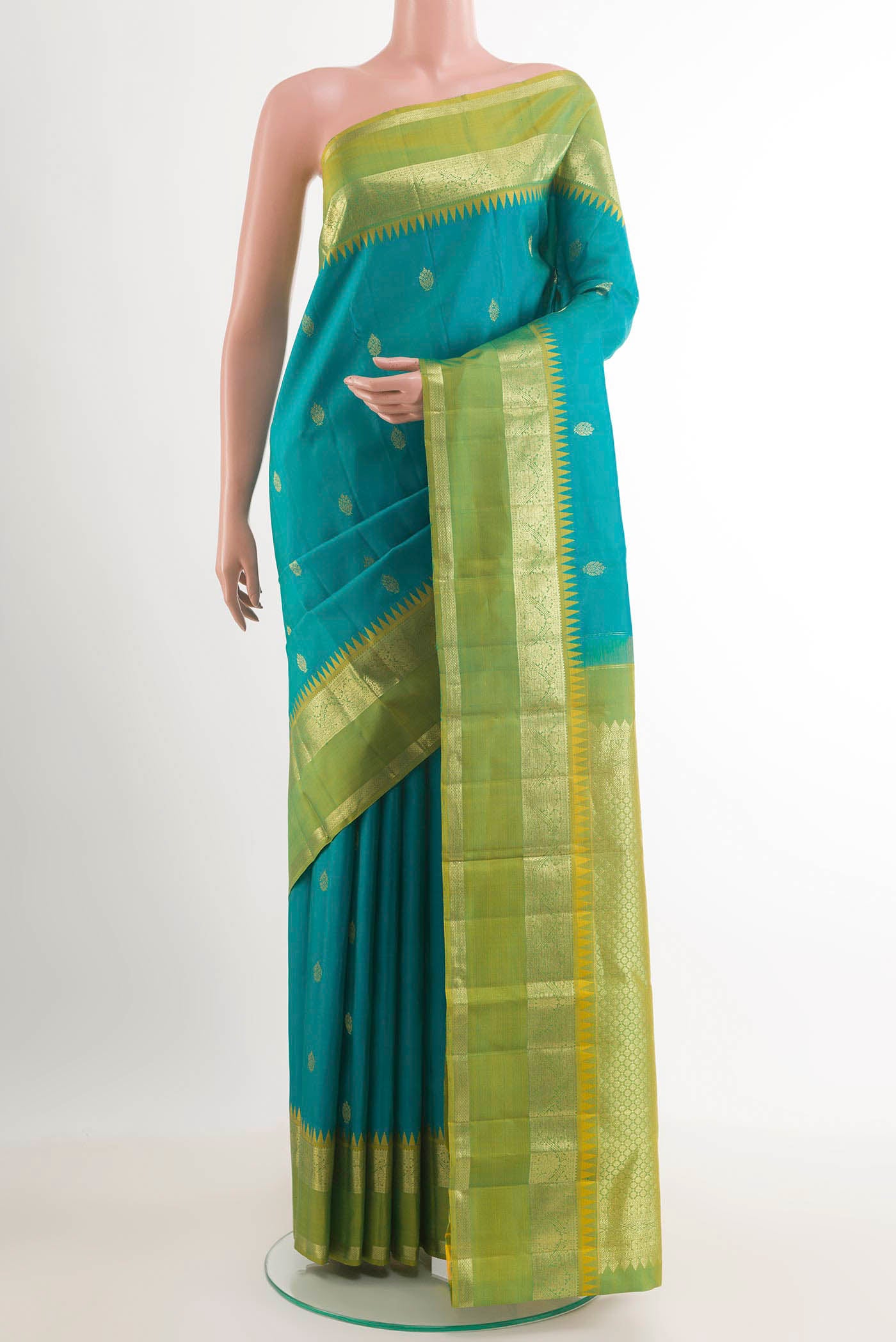 Blue Kanchipuram Silk Saree with Zari Butta on the body and Zari Border.  displayed on a mannequin