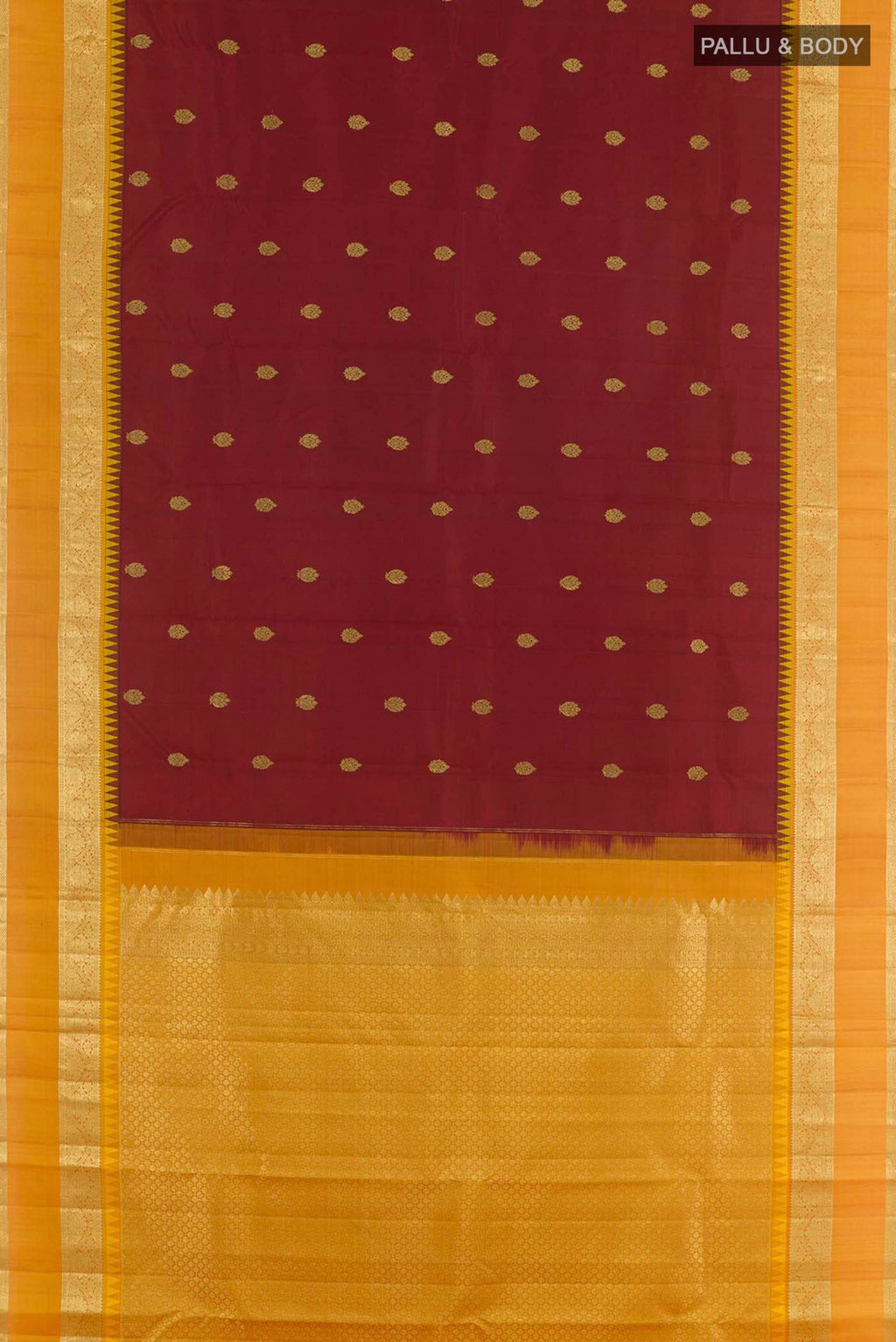Flat view of Maroon Kanchipuram Silk Saree with Zari Butta on the body and Zari Border. 