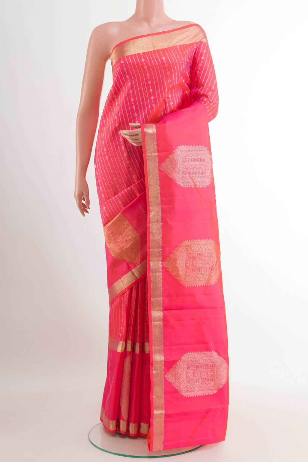 Sea Green Kanjivaram Silk Saree with Zari Brocade on the body and Zari Border.  displayed on a mannequin