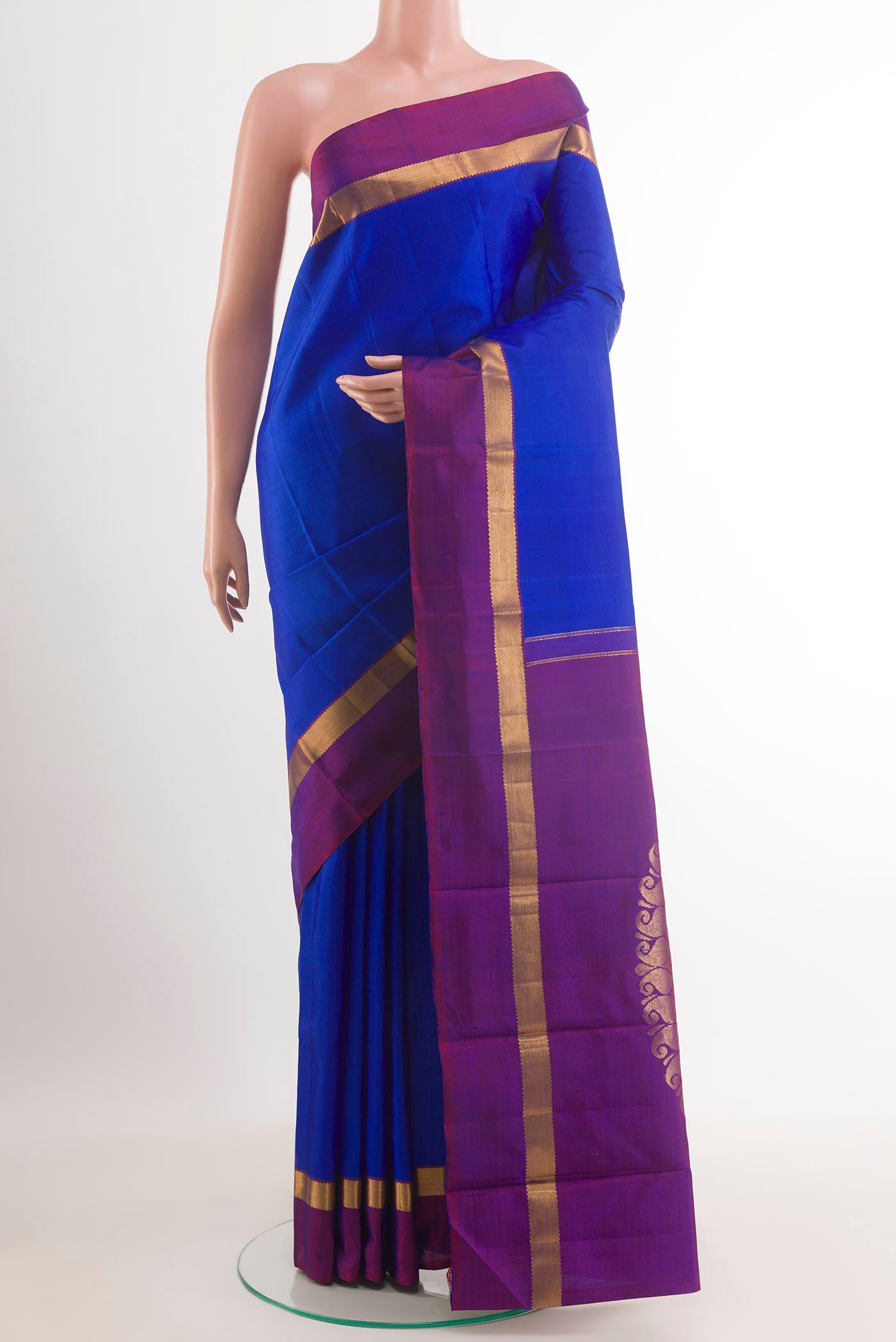 Blue Kanchipuram Silk Saree with Plain Body and Zari Border.  displayed on a mannequin