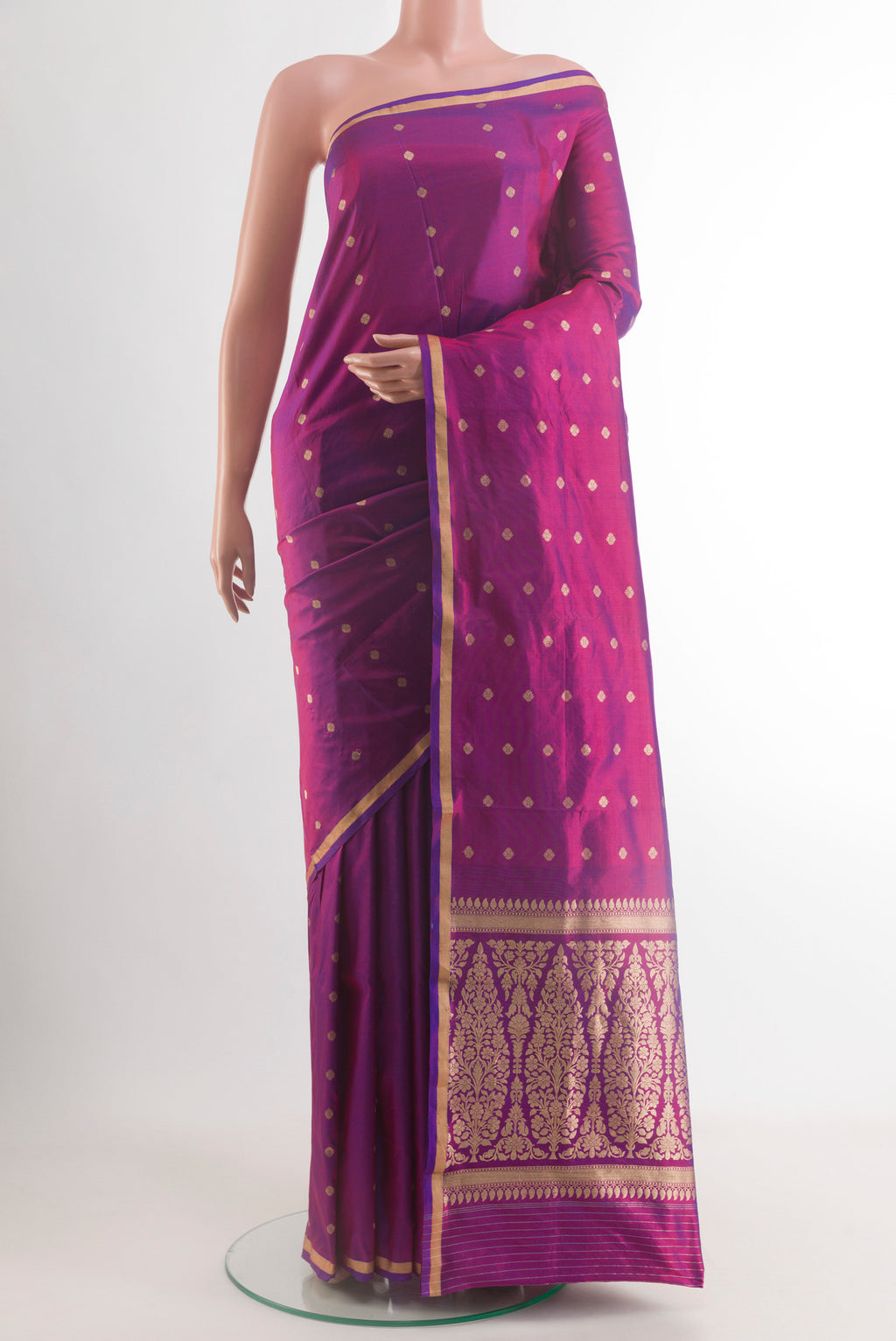 Purple Banarasi Katan Silk Saree with Zari Butta on the body and Zari Border.  displayed on a mannequin