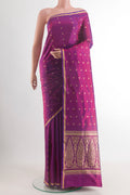 Purple Banarasi Katan Silk Saree with Zari Butta on the body and Zari Border.  displayed on a mannequin
