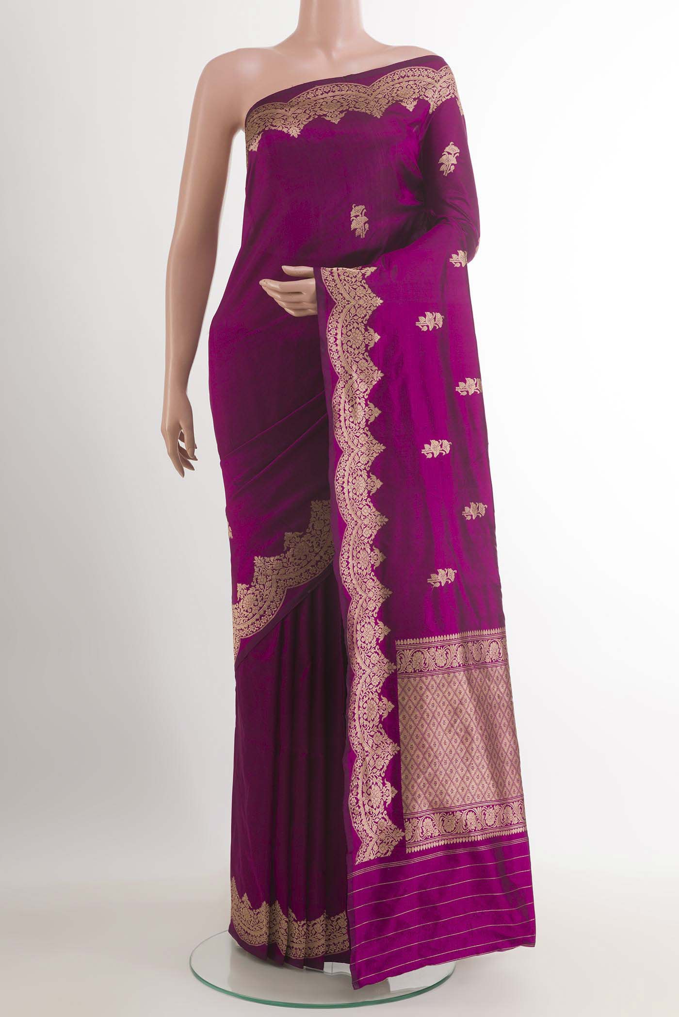 Purple Banarasi Katan Silk Saree with Zari Butta on the body and Zari Border.  displayed on a mannequin