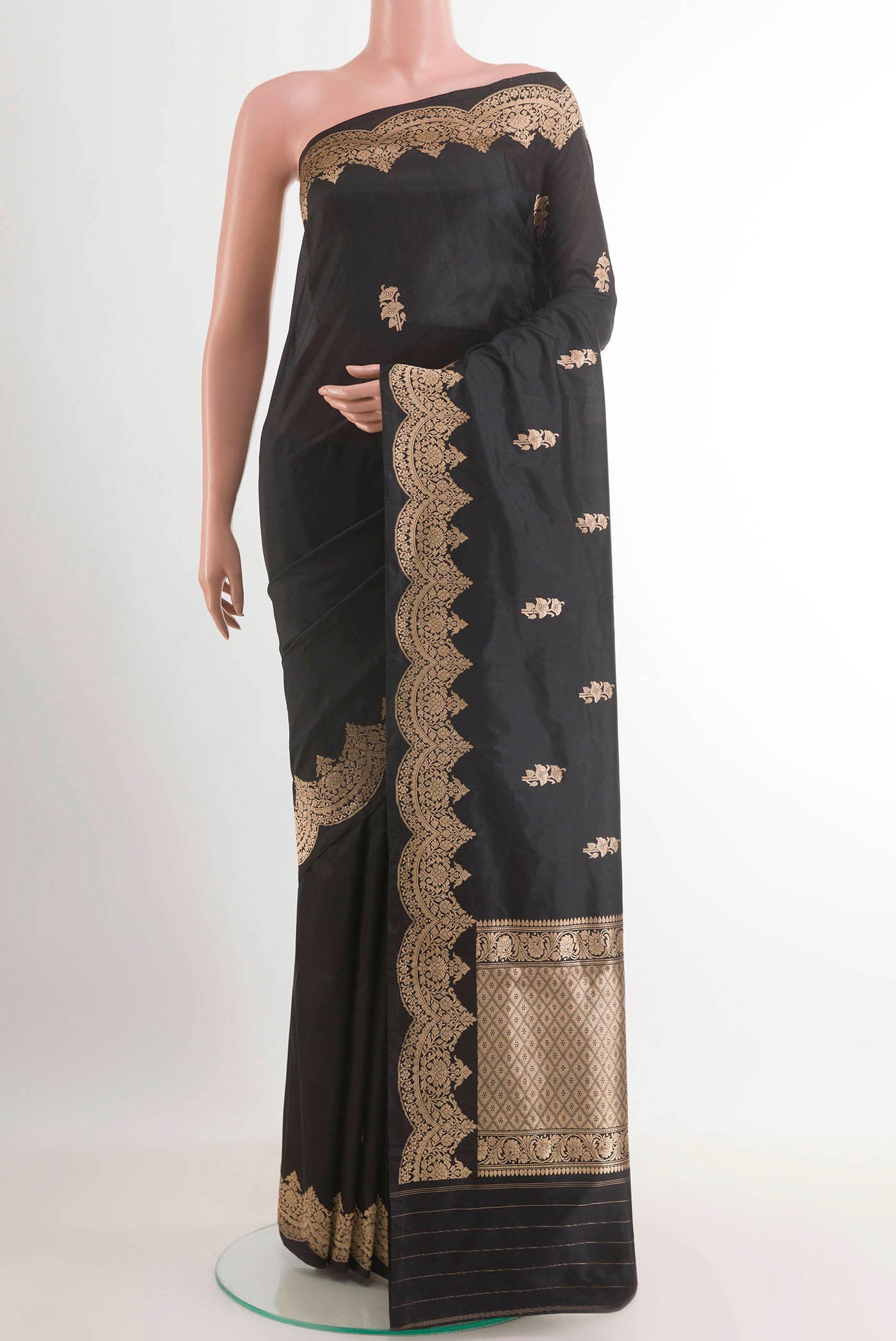 Black Banarasi Katan Silk Saree with Zari Butta on the body and Zari Border.  displayed on a mannequin