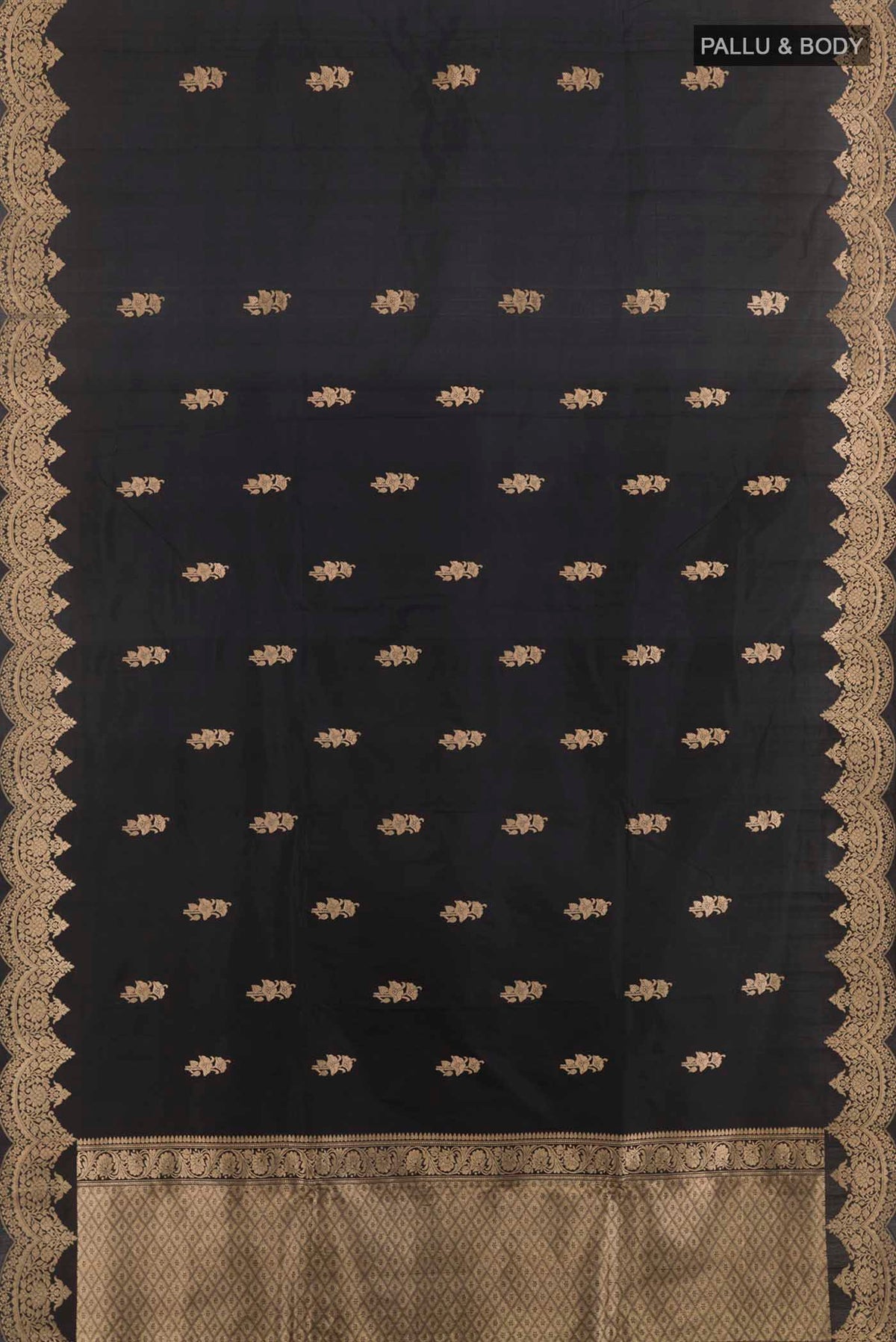 Flat view of Black Banarasi Katan Silk Saree with Zari Butta on the body and Zari Border. 