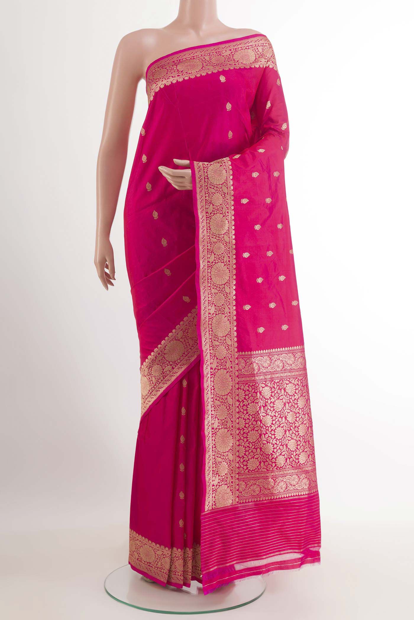Pink Banarasi Katan Silk Saree with Zari Butta on the body and Zari Border.  displayed on a mannequin