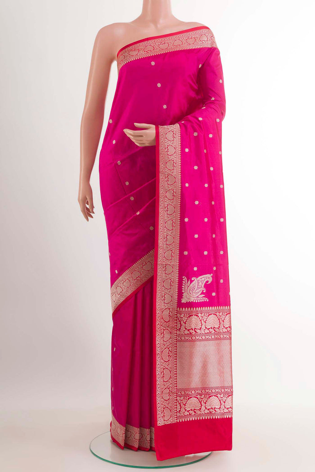 Pink Banarasi Katan Silk Saree with Zari Butta on the body and Zari Border.  displayed on a mannequin