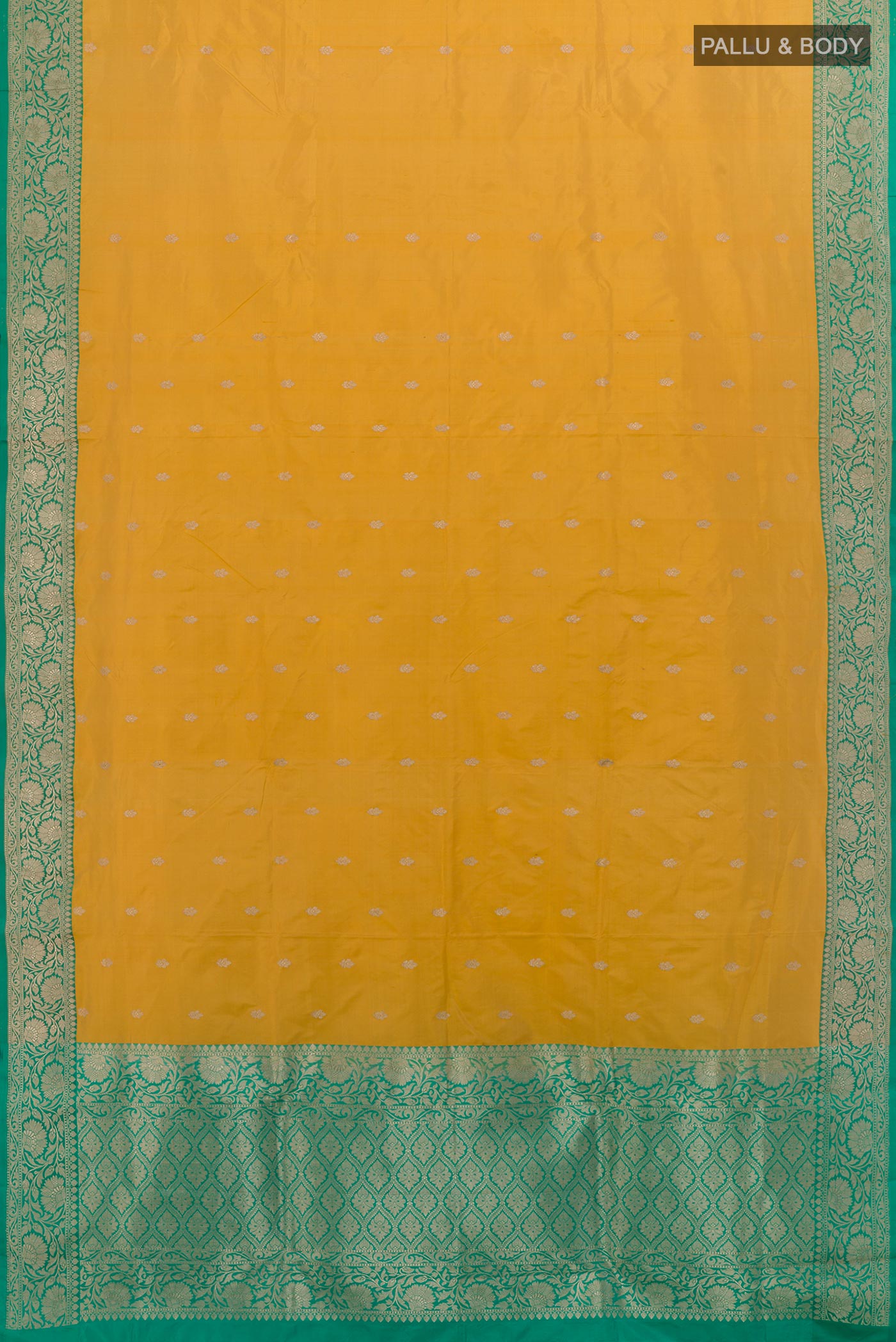 Flat view of Yellow Banarasi Katan Silk Saree with Zari Butta on the body and Zari Border. 