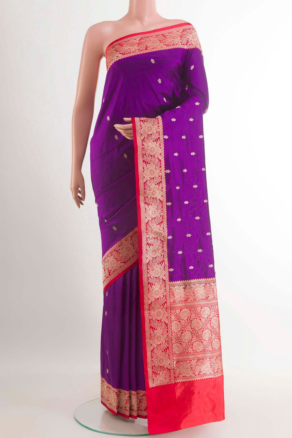 Purple Banarasi Katan Silk Saree with Zari Butta on the body and Zari Border.  displayed on a mannequin