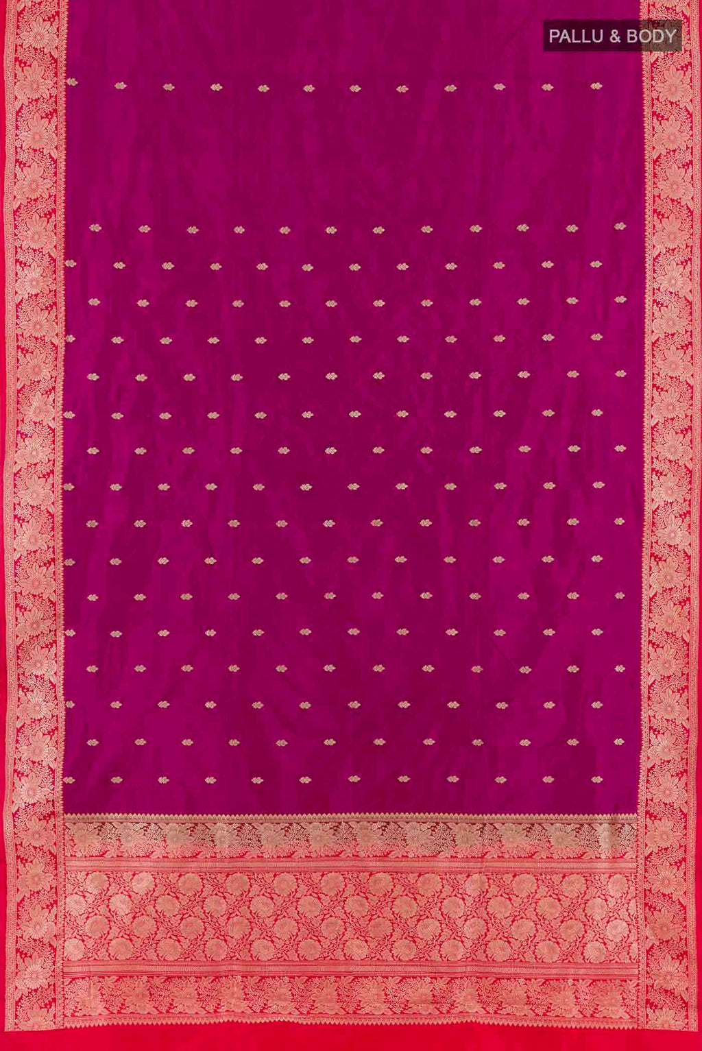 Flat view of Rani Pink Banarasi Katan Silk Saree with Zari Butta on the body and Zari Border. 