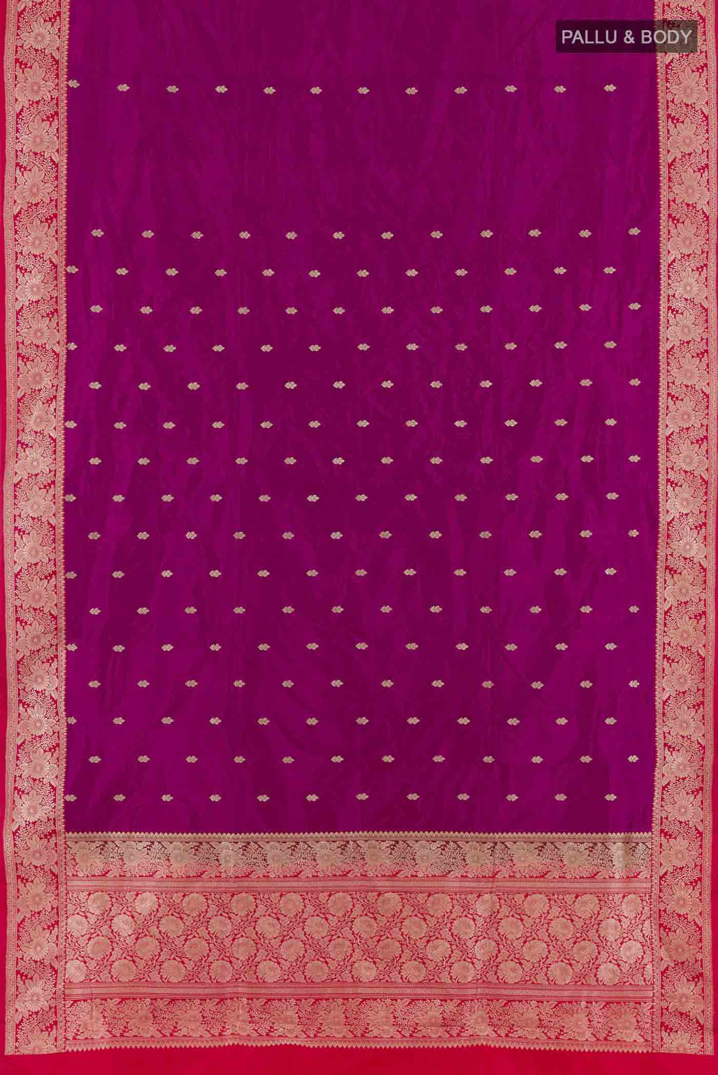 Flat view of Rani Pink Banarasi Katan Silk Saree with Zari Butta on the body and Zari Border. 