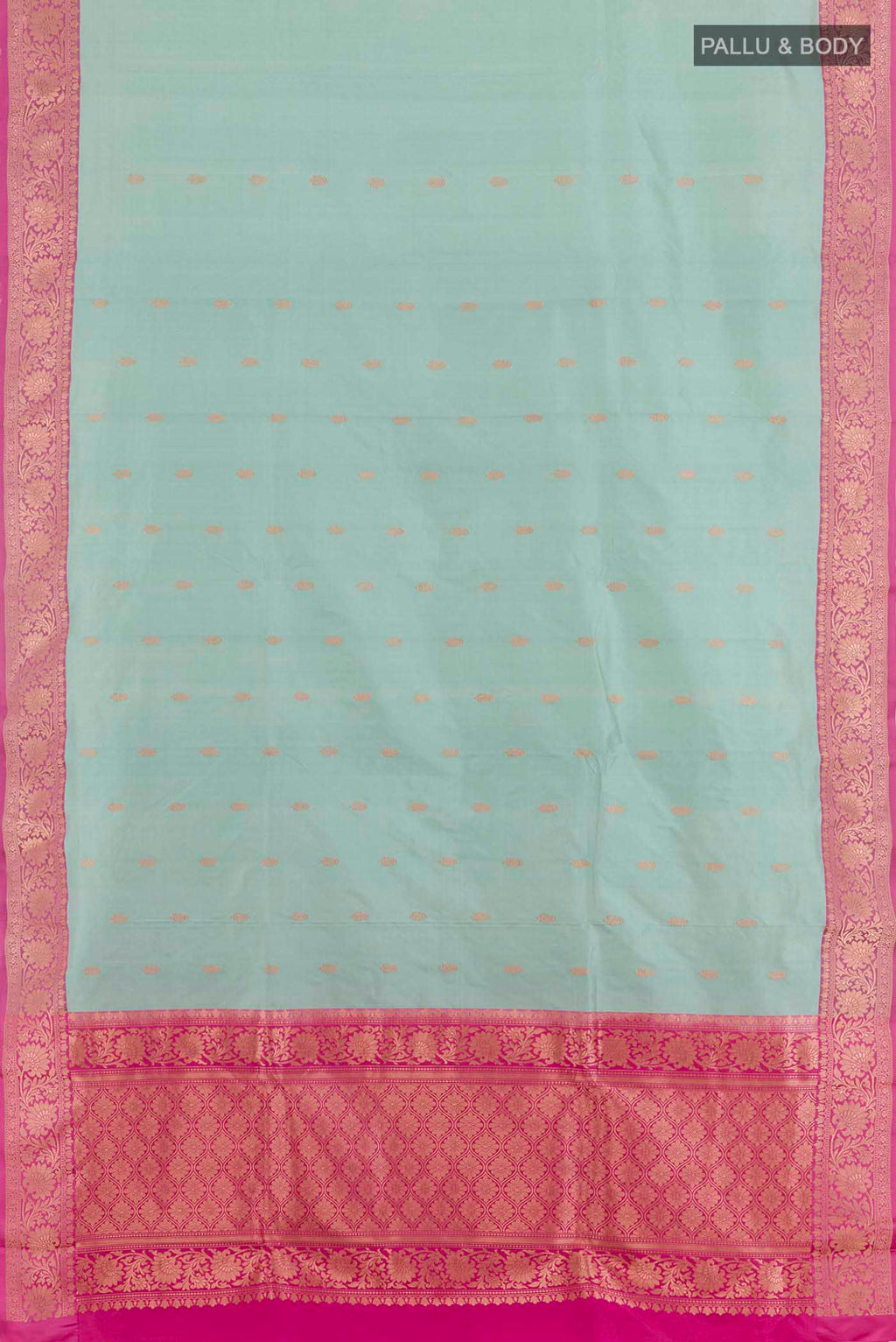 Flat view of Sky Blue Banarasi Katan Silk Saree with Zari Butta on the body and Zari Border. 