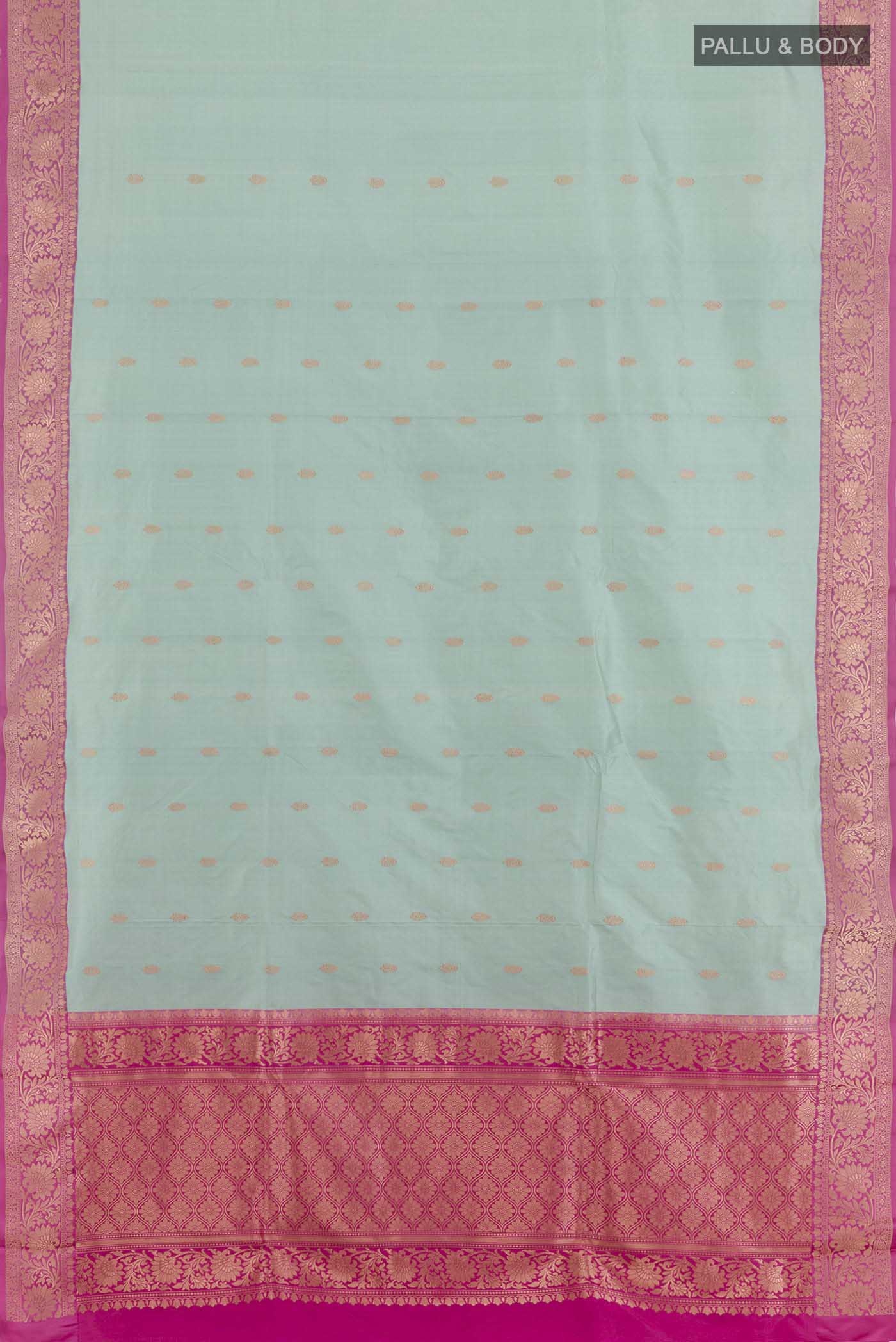 Flat view of Sky Blue Banarasi Katan Silk Saree with Zari Butta on the body and Zari Border. 