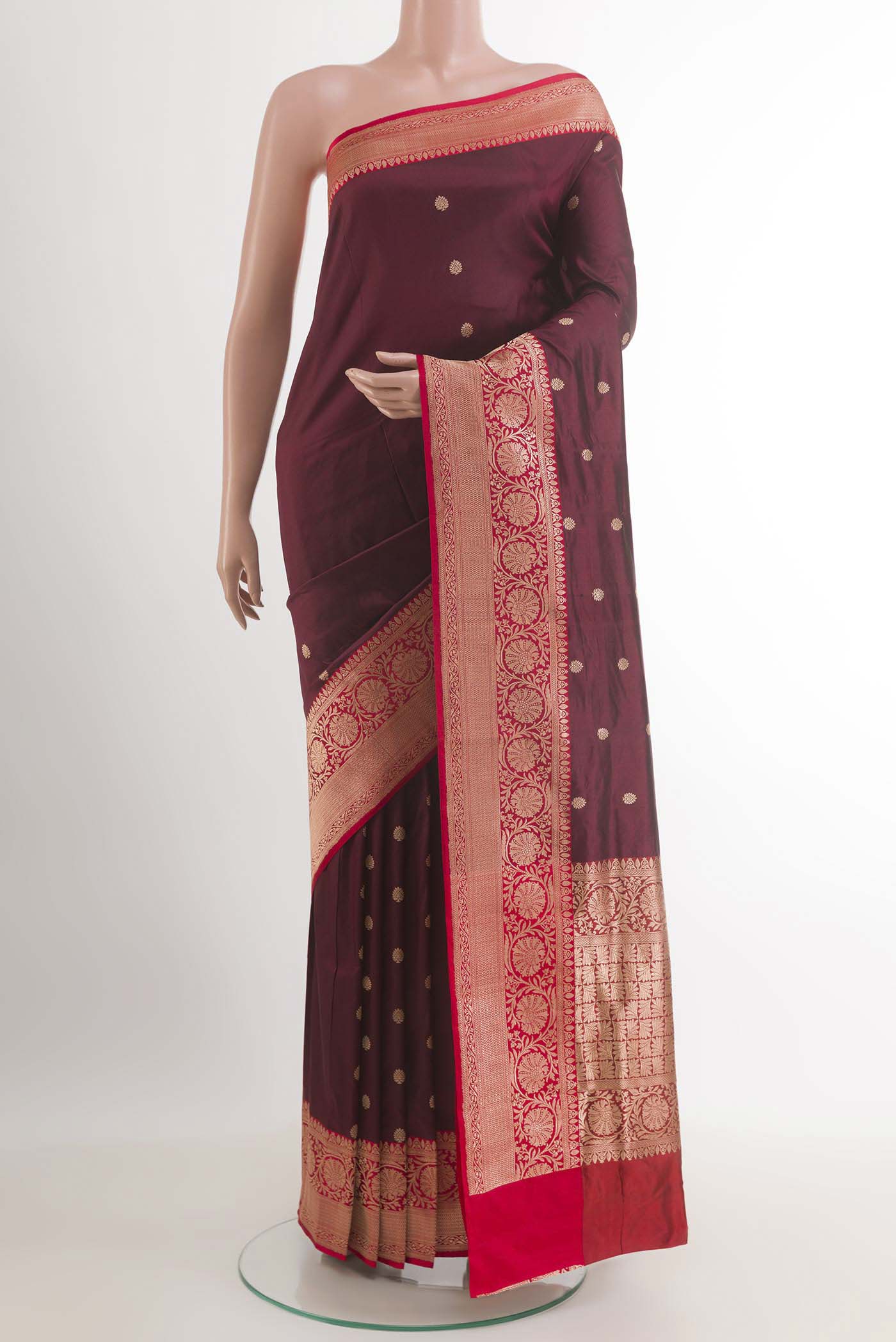 Brown Banarasi Katan Silk Saree with Zari Butta on the body and Zari Border.  displayed on a mannequin