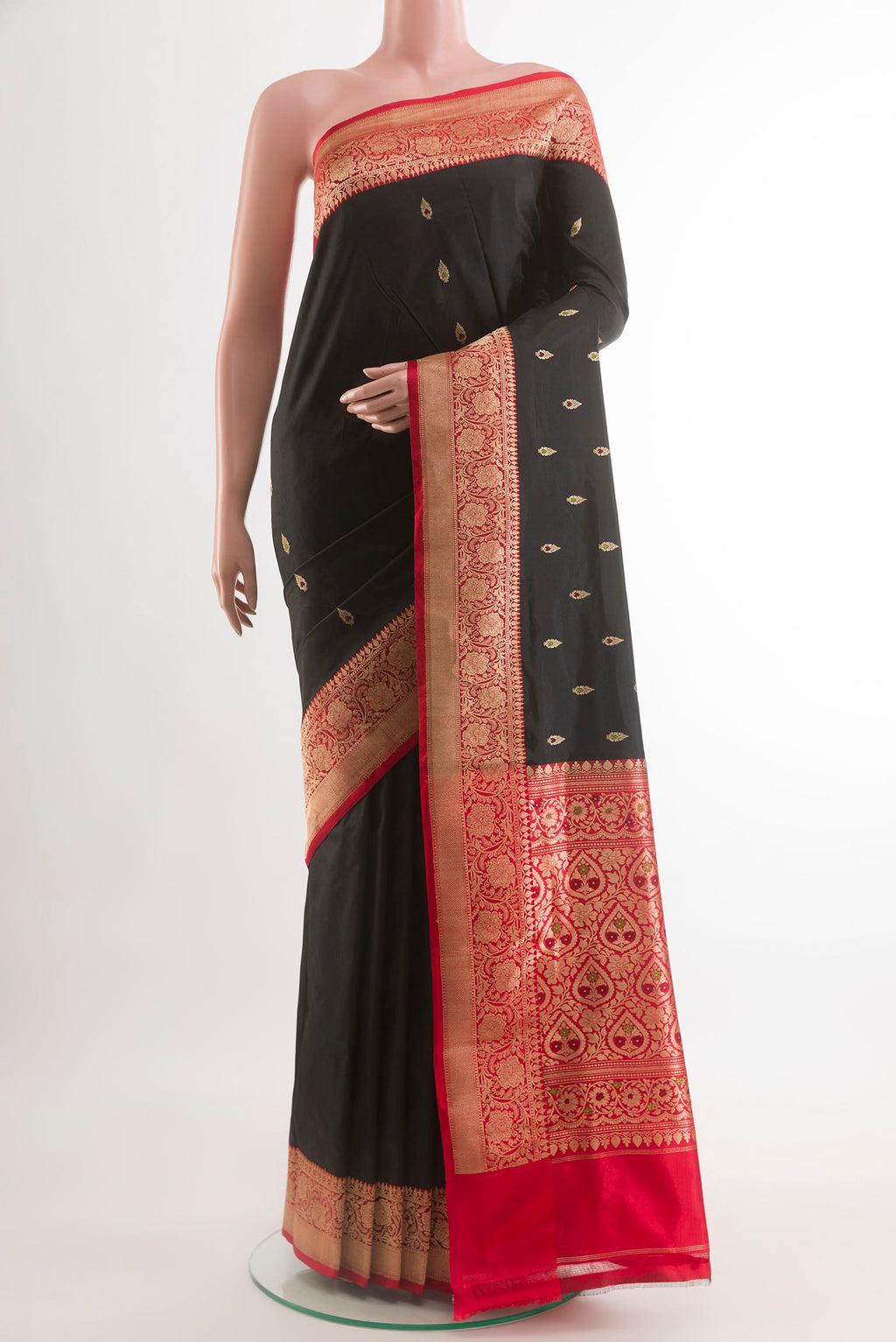 Black Banarasi Katan Silk Saree with Zari Butta on the body and Zari Border.  displayed on a mannequin