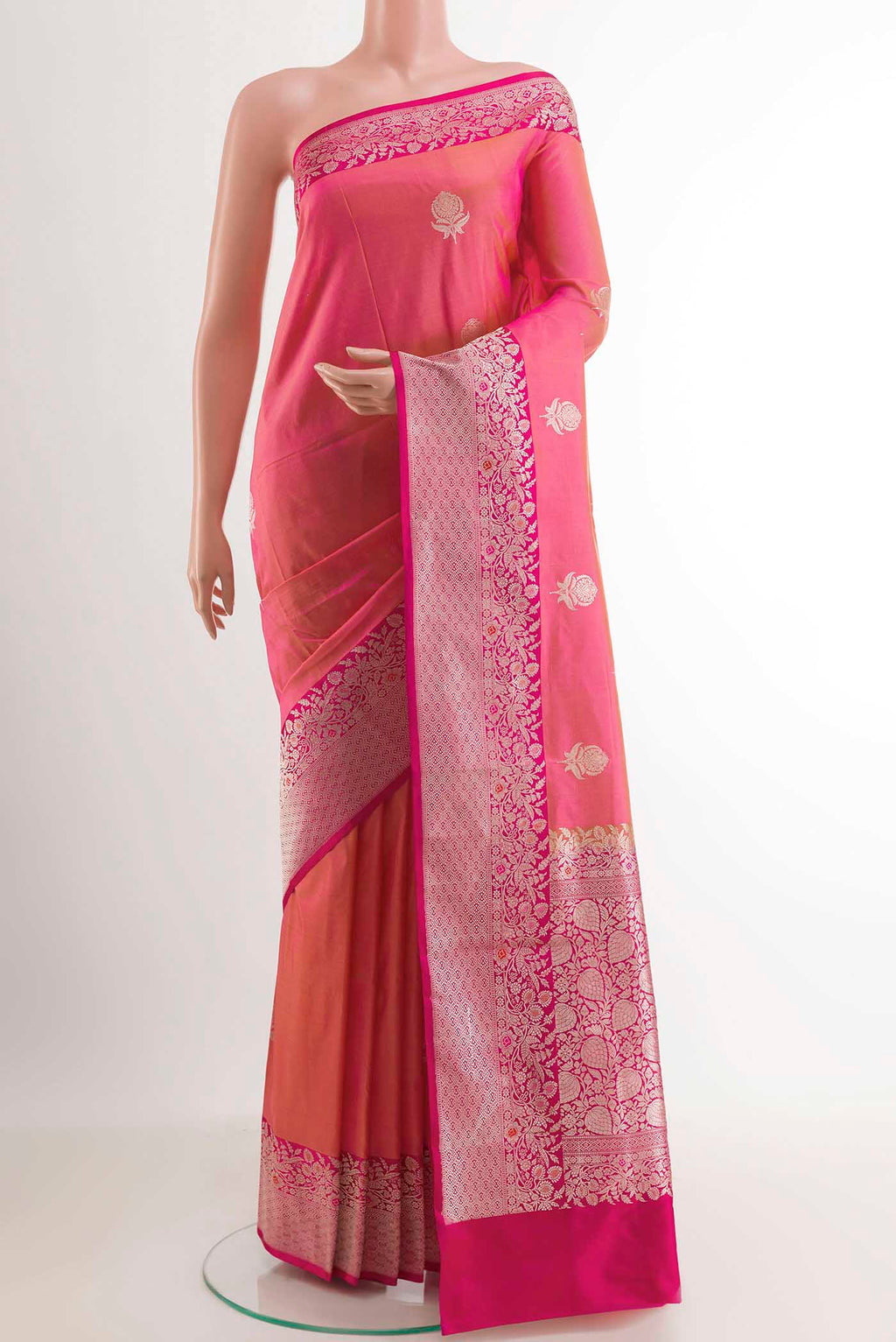 Peach Dual Tone Banarasi Katan Silk Saree with Zari Butta on the body and Zari Border.  displayed on a mannequin