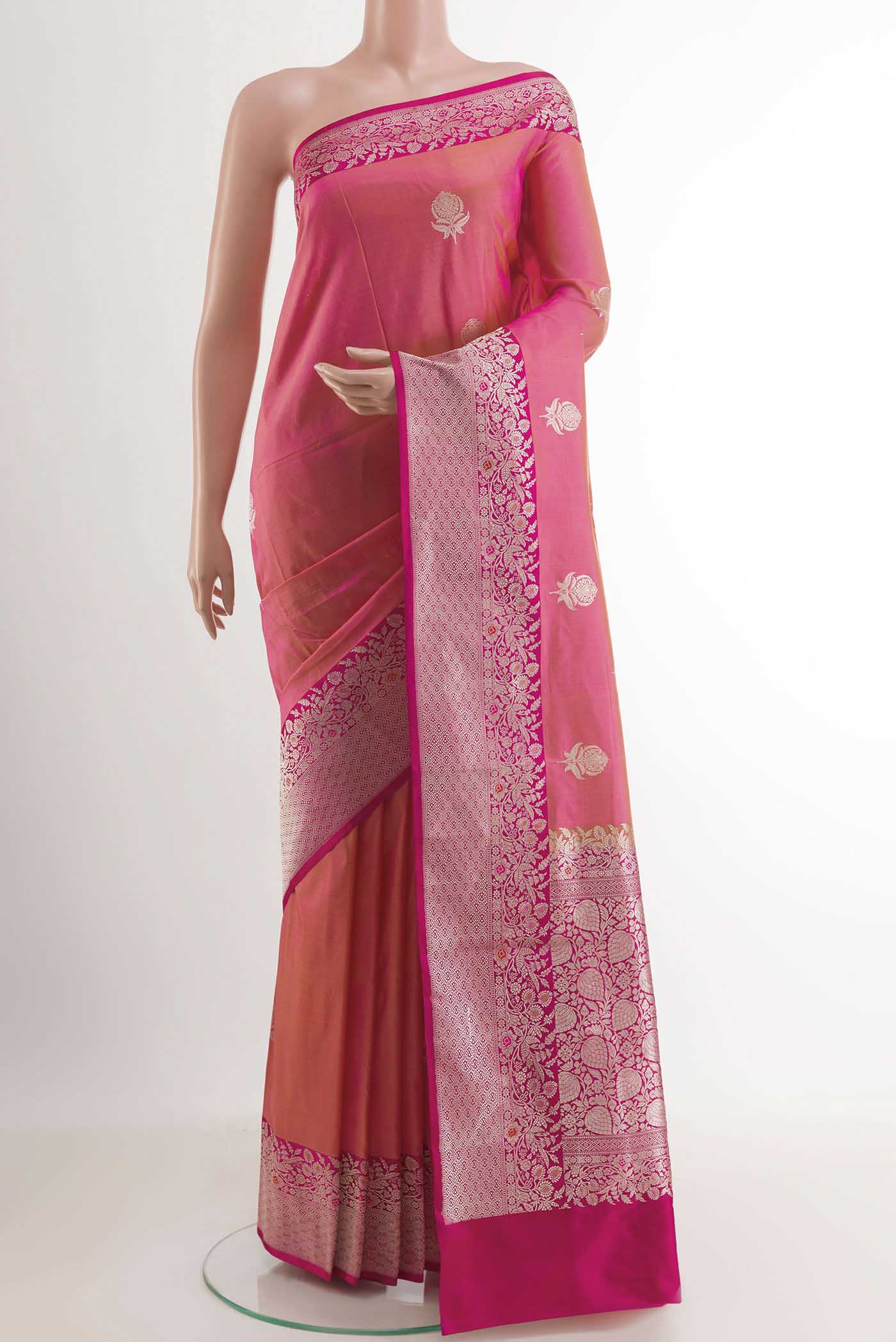 Peach Dual Tone Banarasi Katan Silk Saree with Zari Butta on the body and Zari Border.  displayed on a mannequin
