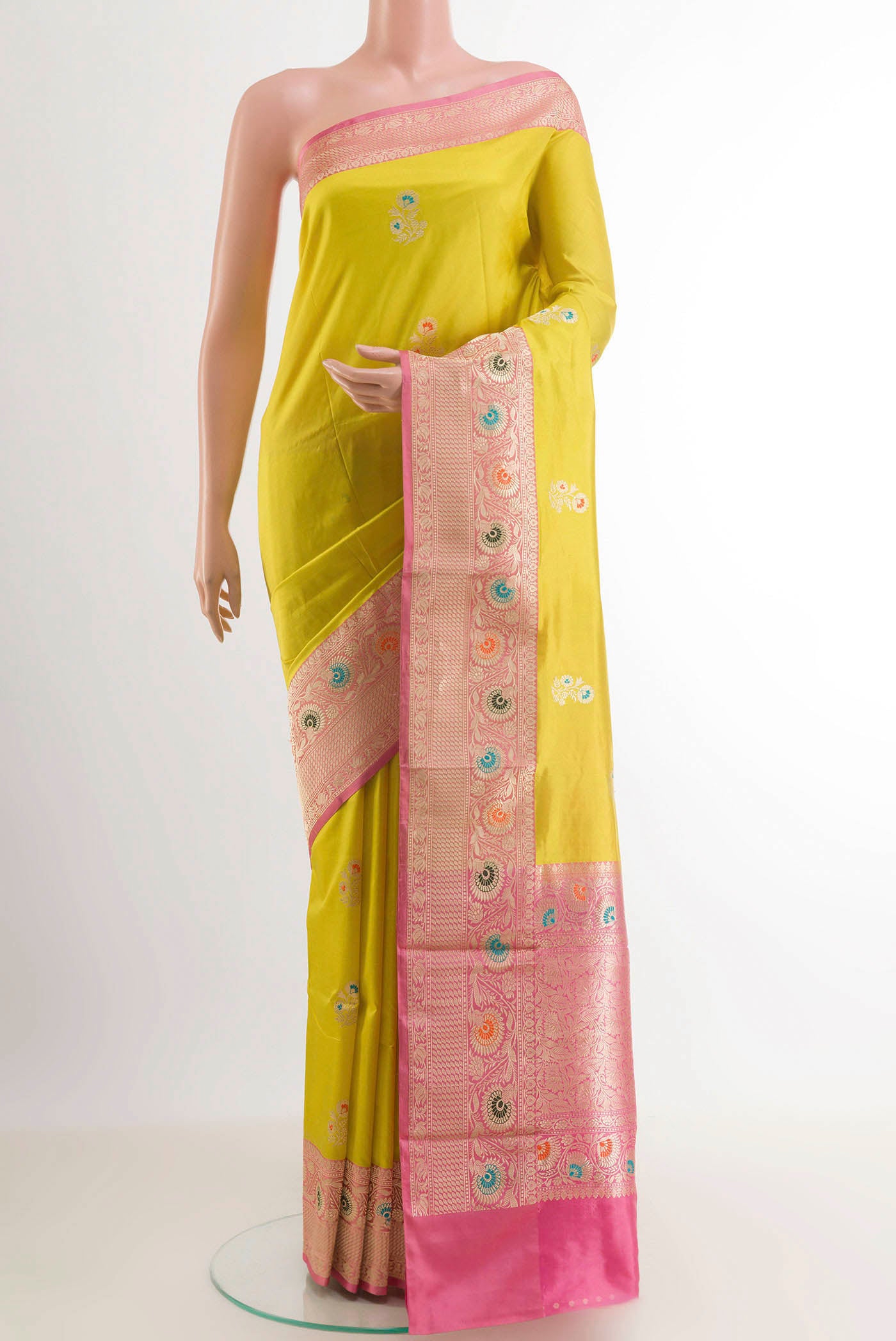Yellow Dual Tone Banarasi Katan Silk Saree with Zari Butta on the body and Zari Border.  displayed on a mannequin