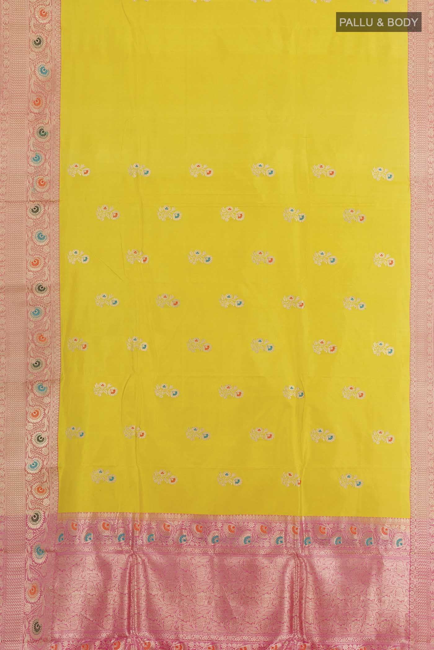 Flat view of Yellow Dual Tone Banarasi Katan Silk Saree with Zari Butta on the body and Zari Border. 