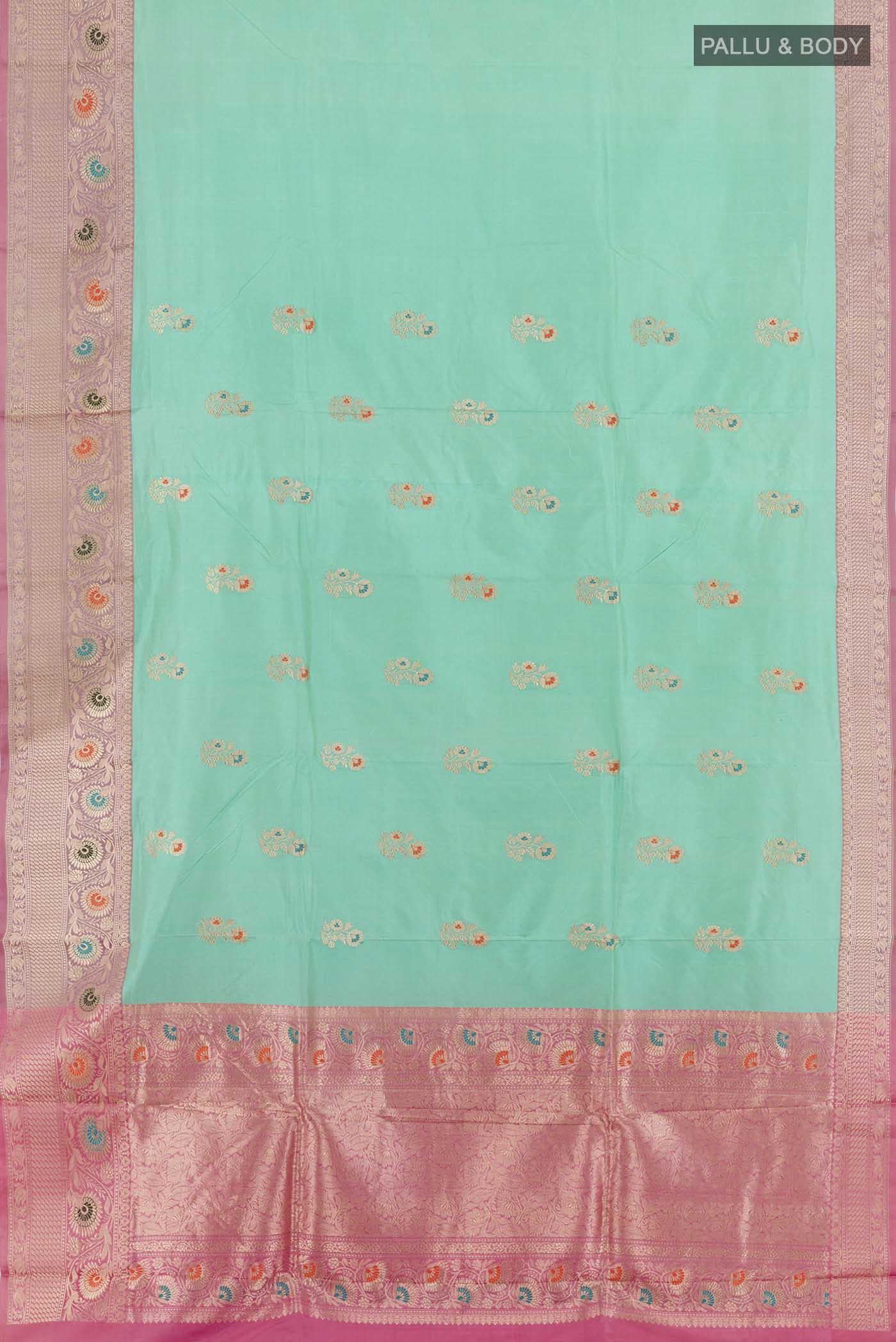 Flat view of Turquoise Banarasi Katan Silk Saree with Zari Butta on the body and Zari Border. 