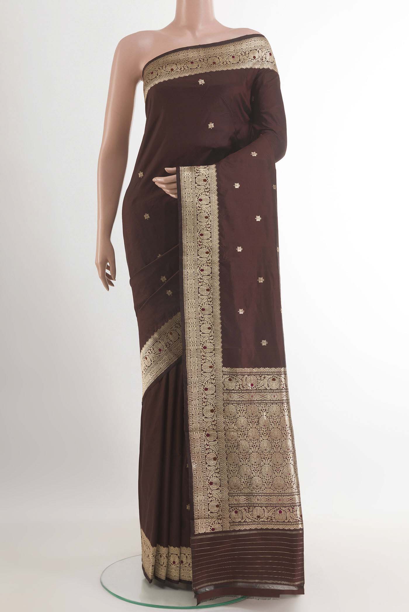 Brown Banarasi Katan Silk Saree with Zari Butta on the body and Zari Border.  displayed on a mannequin