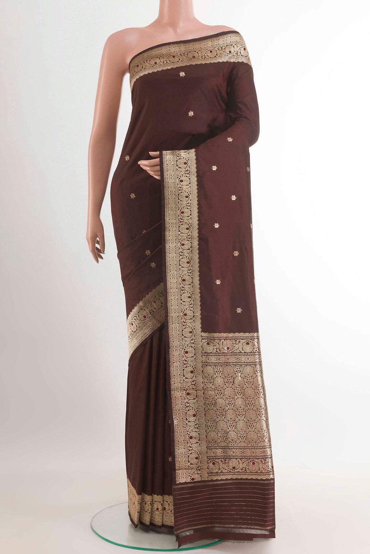 Brown Banarasi Katan Silk Saree with Zari Butta on the body and Zari Border.  displayed on a mannequin