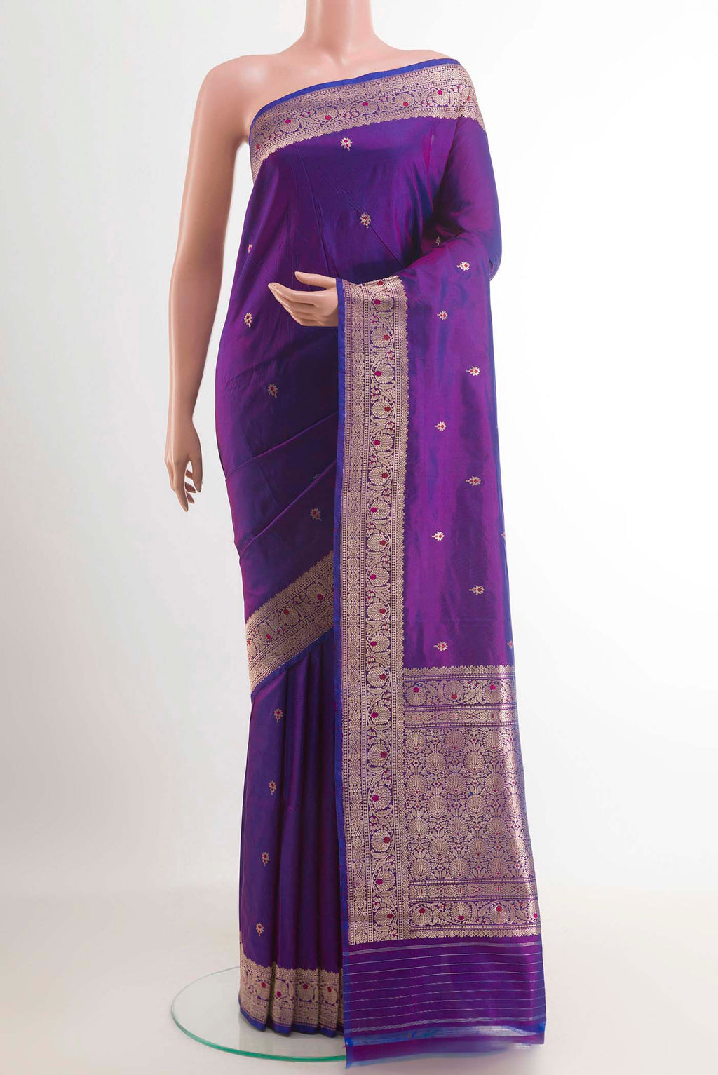 Purple Banarasi Katan Silk Saree with Zari Butta on the body and Zari Border.  displayed on a mannequin