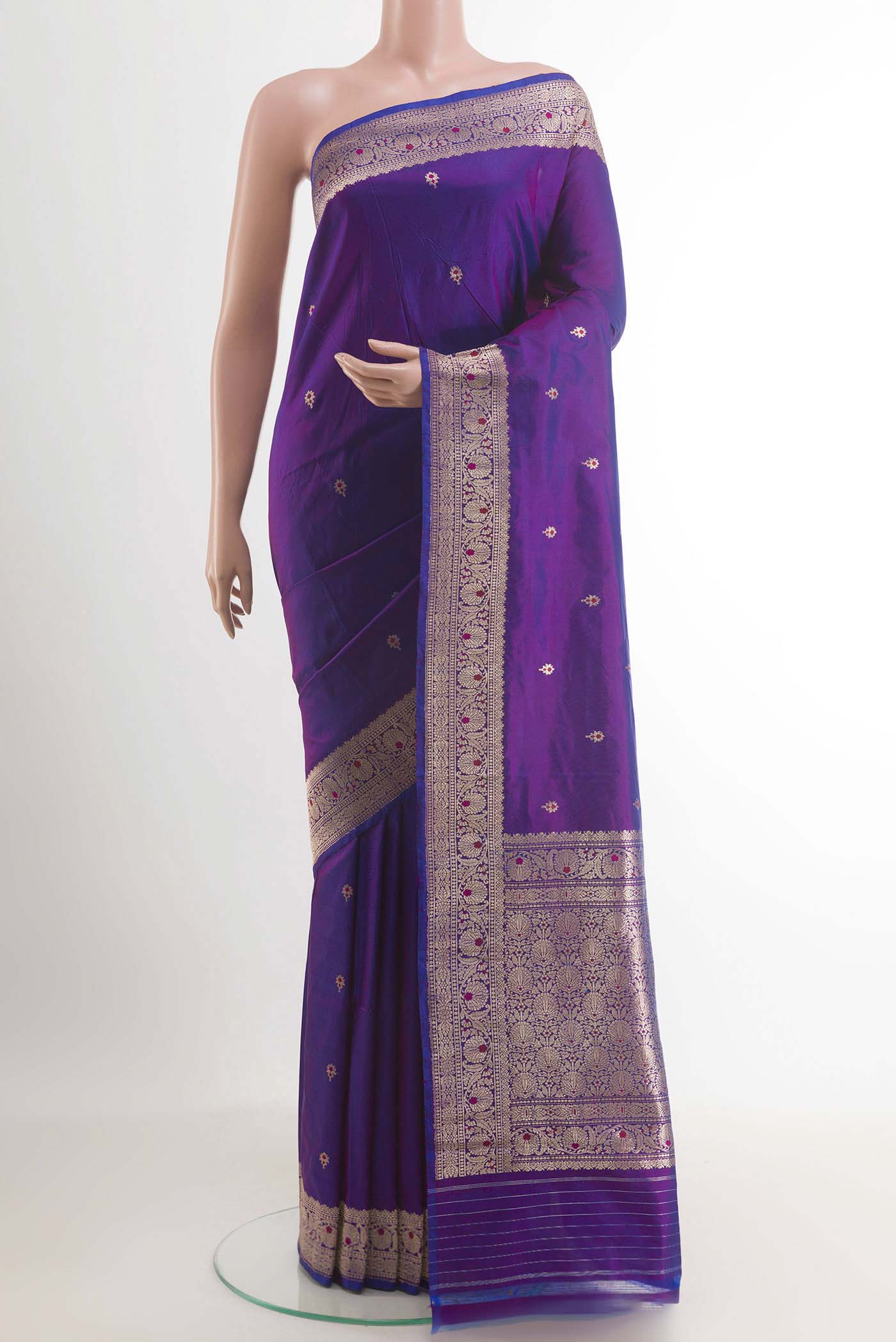 Purple Banarasi Katan Silk Saree with Zari Butta on the body and Zari Border.  displayed on a mannequin
