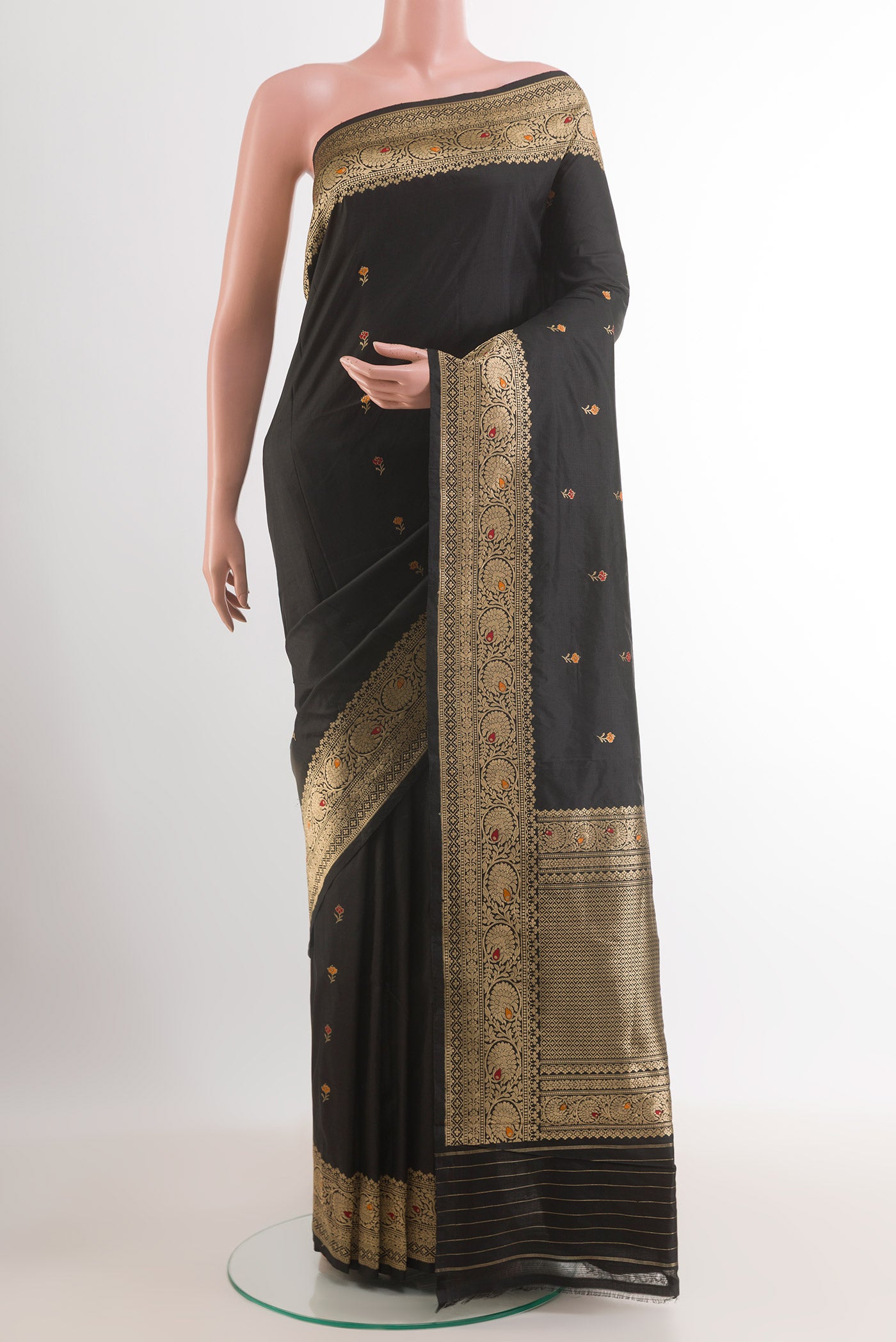 Black Banarasi Katan Silk Saree with Zari Butta on the body and Zari Border.  displayed on a mannequin